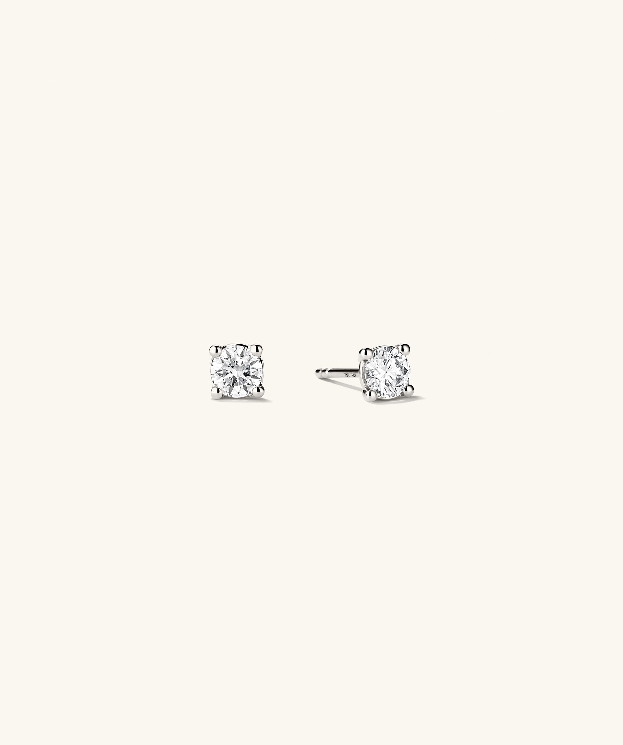Lab Grown Diamond Round Studs 0.5 TCW, featuring sparkling lab-grown diamonds set in 14k solid gold, showcasing a classic and elegant design.