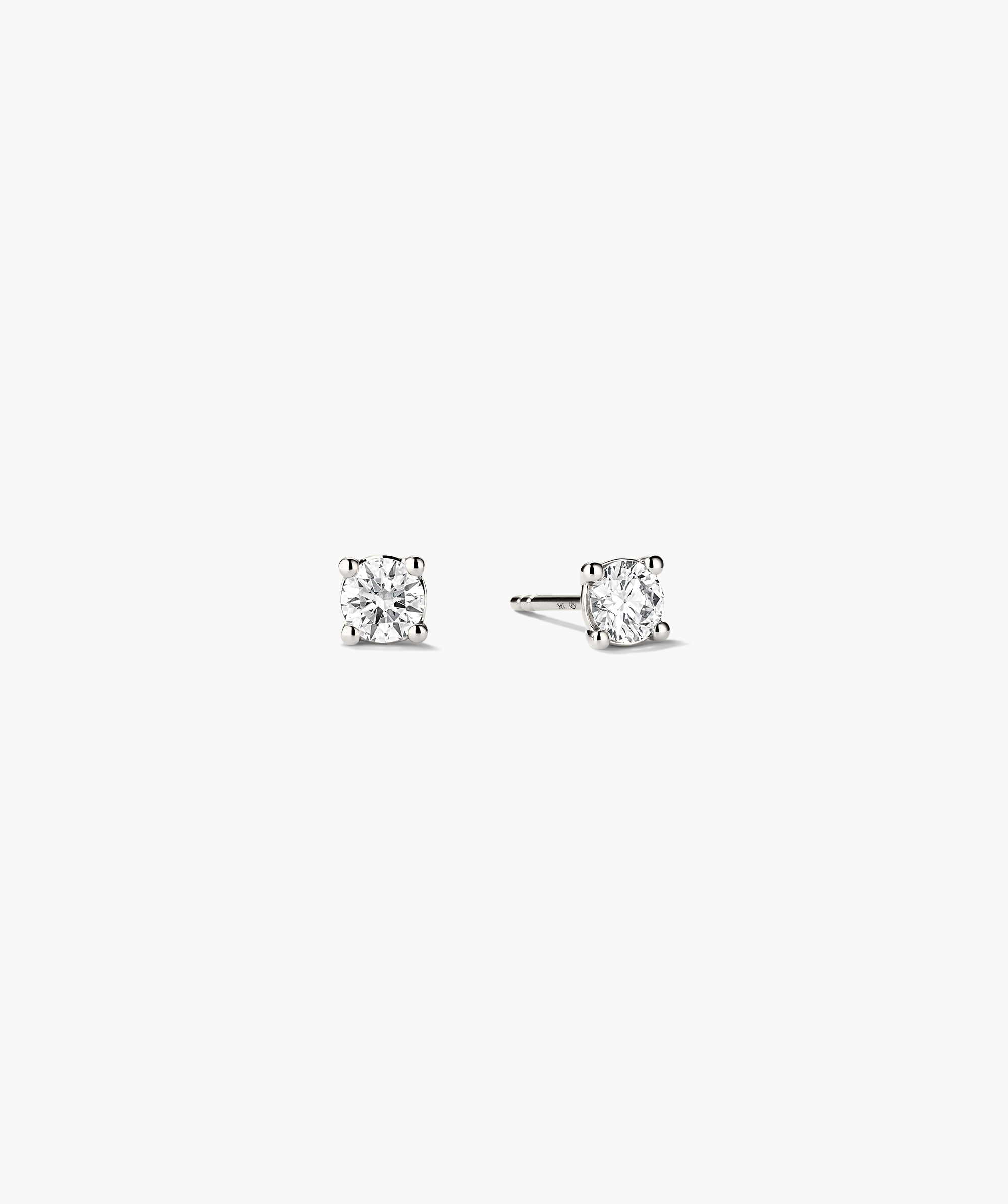 Lab Grown Diamond Round Studs 0.5 TCW, featuring sparkling lab-grown diamonds set in 14k solid gold, showcasing a classic and elegant design.