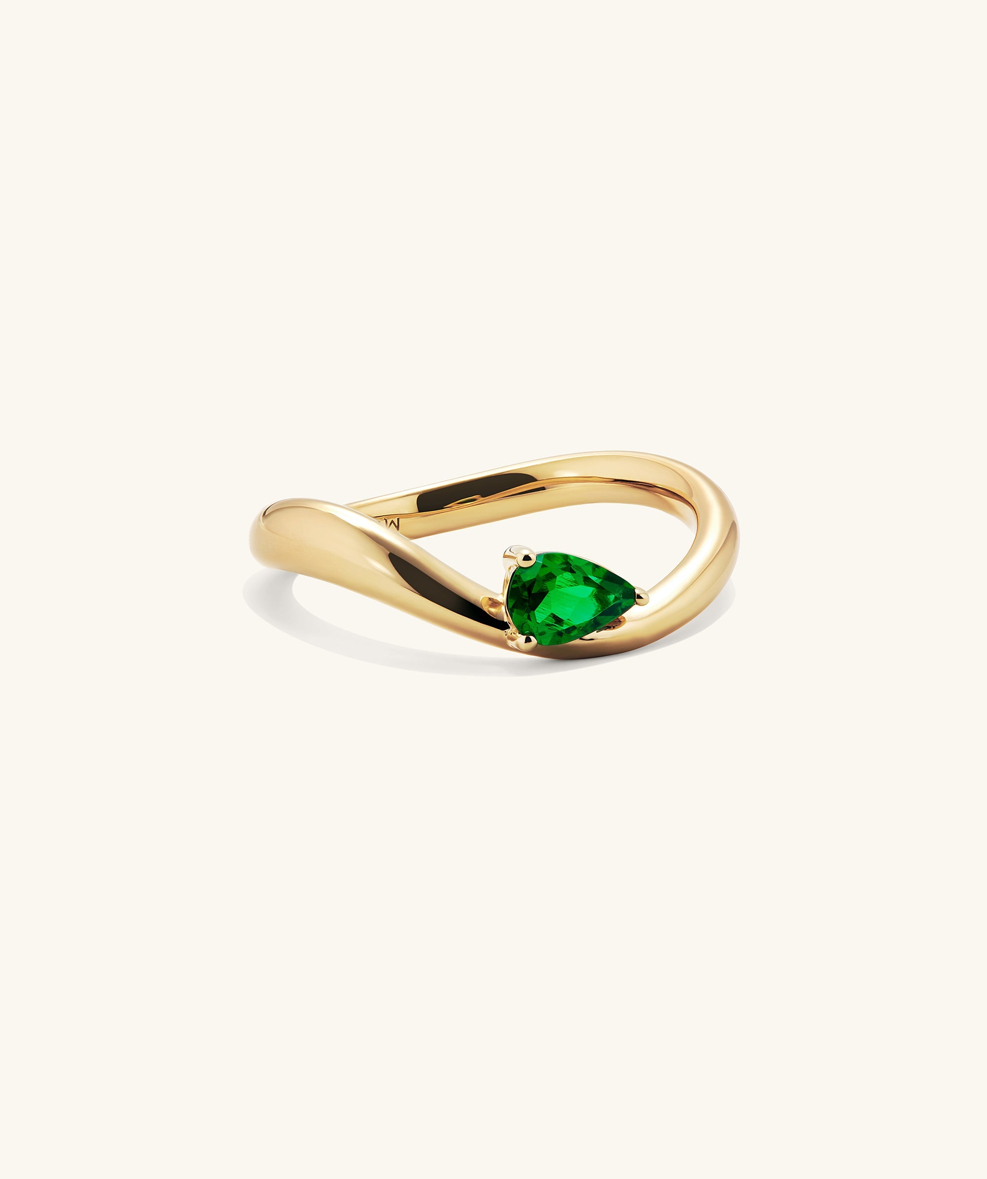 DÃ´me Figure Balance Ring showcasing a pear cut gemstone elegantly floating above the band, ideal for layering with other DÃ´me Figure Rings.