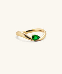 DÃ´me Figure Balance Ring showcasing a pear cut gemstone elegantly floating above the band, ideal for layering with other DÃ´me Figure Rings.