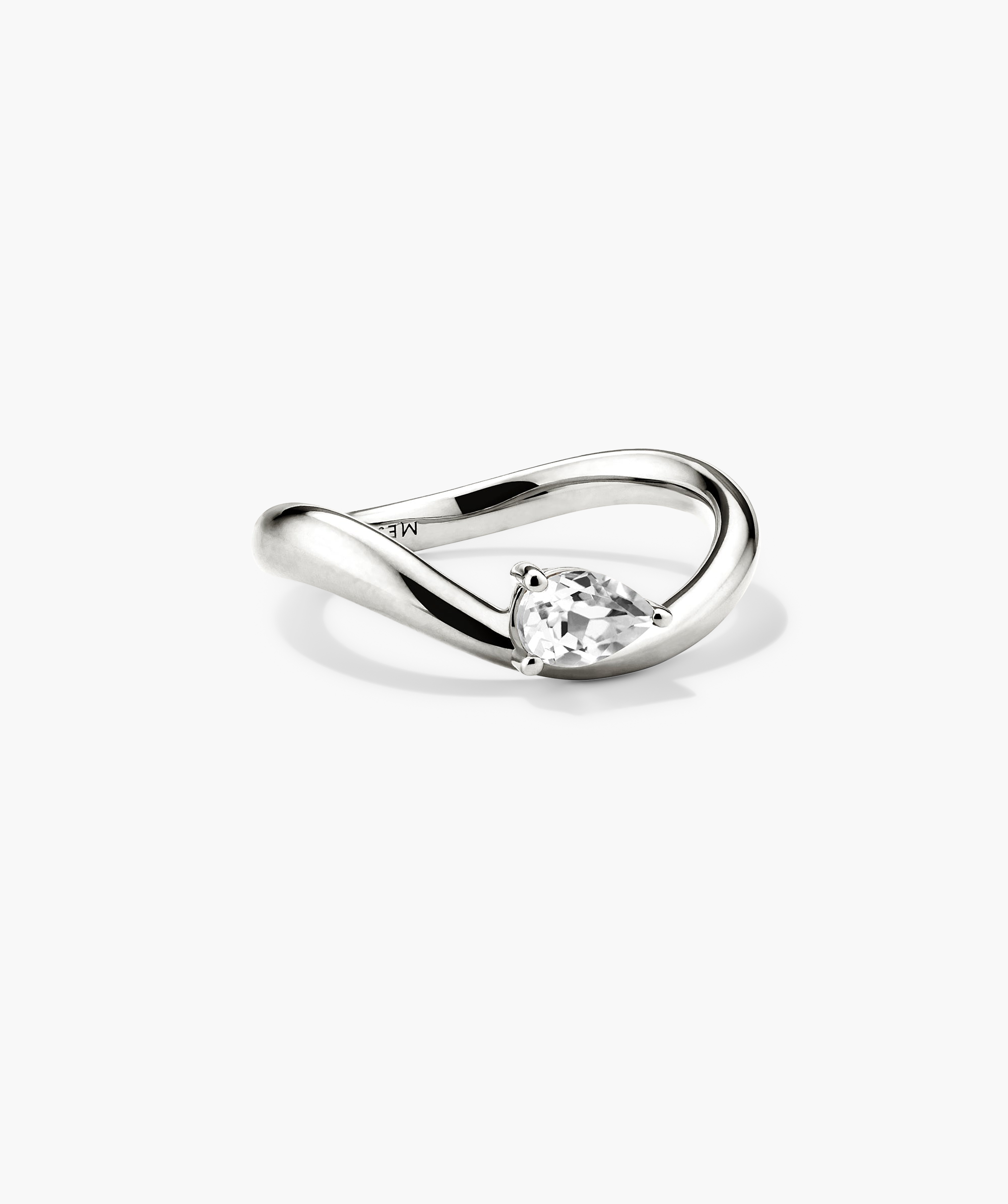 DÃ´me Figure Balance Ring with a pear cut gemstone elegantly floating above the band, ideal for layering with other DÃ´me Figure Rings.