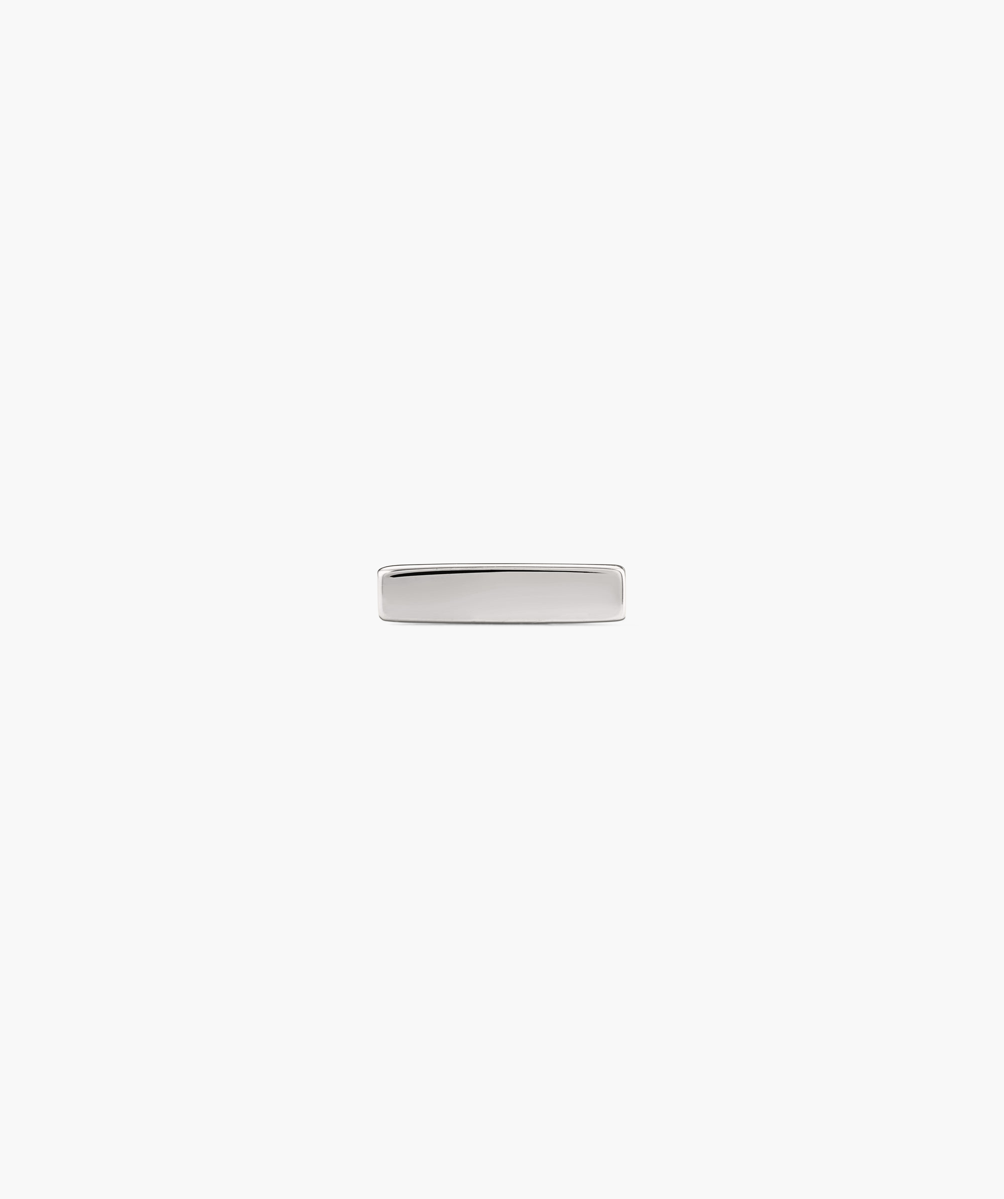 Piercing Studio - Bar Flat Back Stud, a sleek silver rectangular stud, perfect for stacking, showcased on a plain backdrop.