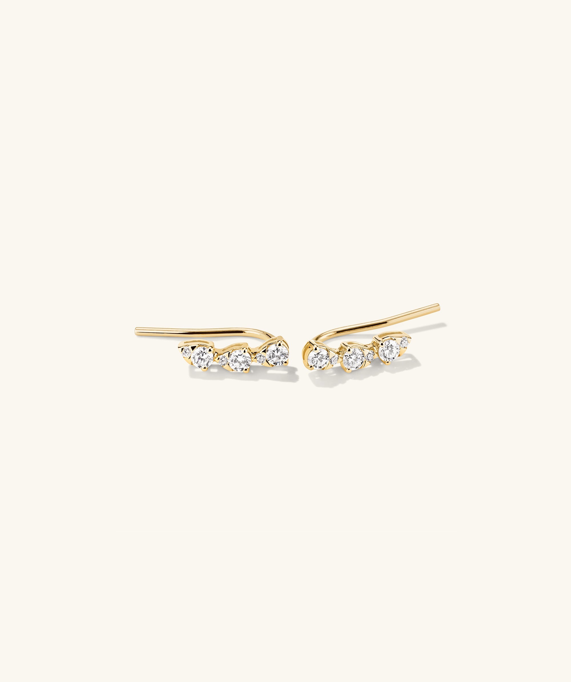 Lab Grown Diamond Pear Climber Studs featuring a trio of diamonds elegantly set in gold, designed to draw attention upward.