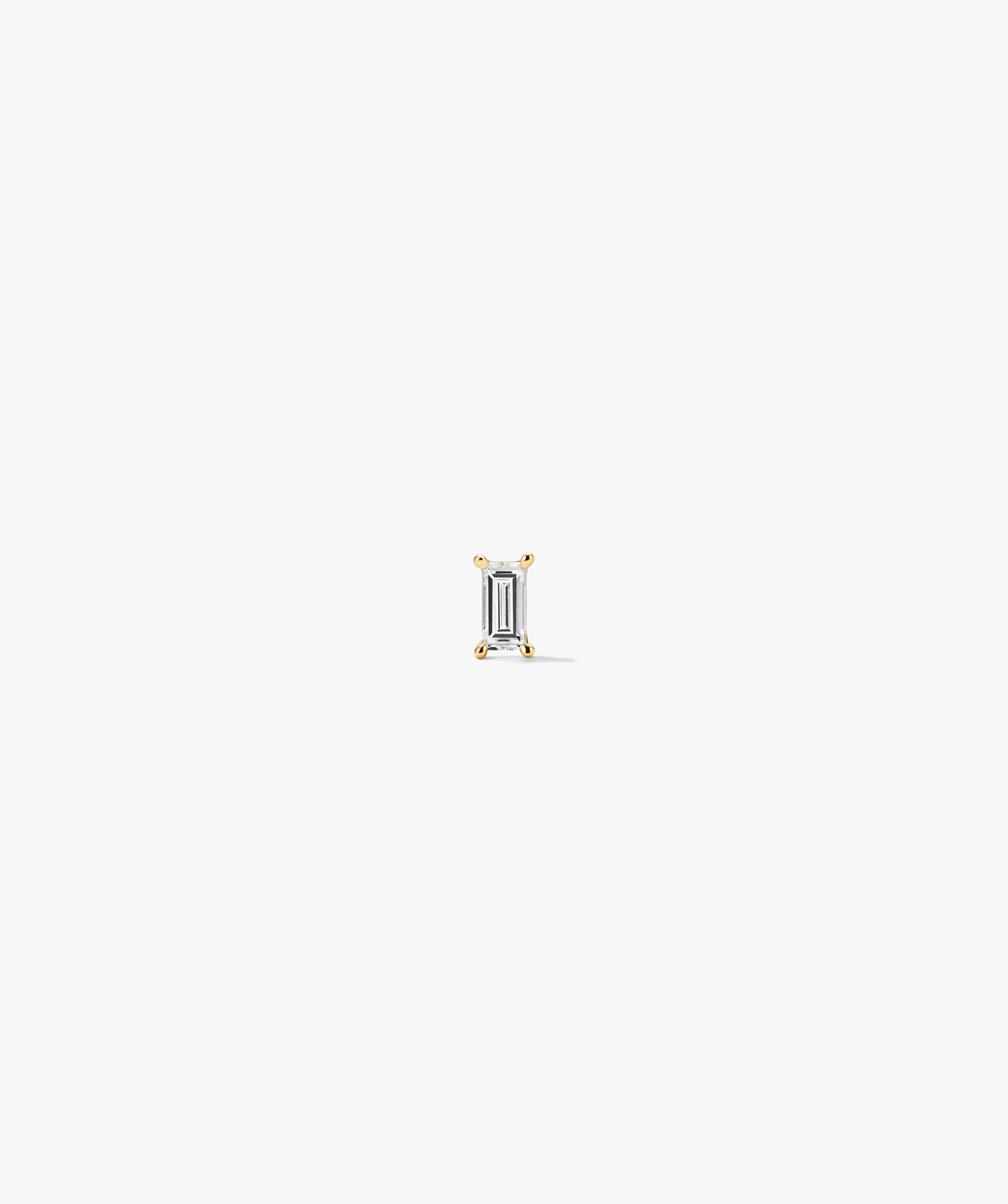 Mini Baguette Stud close-up, showcasing a sparkling baguette cut diamond designed for stacking. Flat back for comfort, includes two post sizes for a perfect fit.