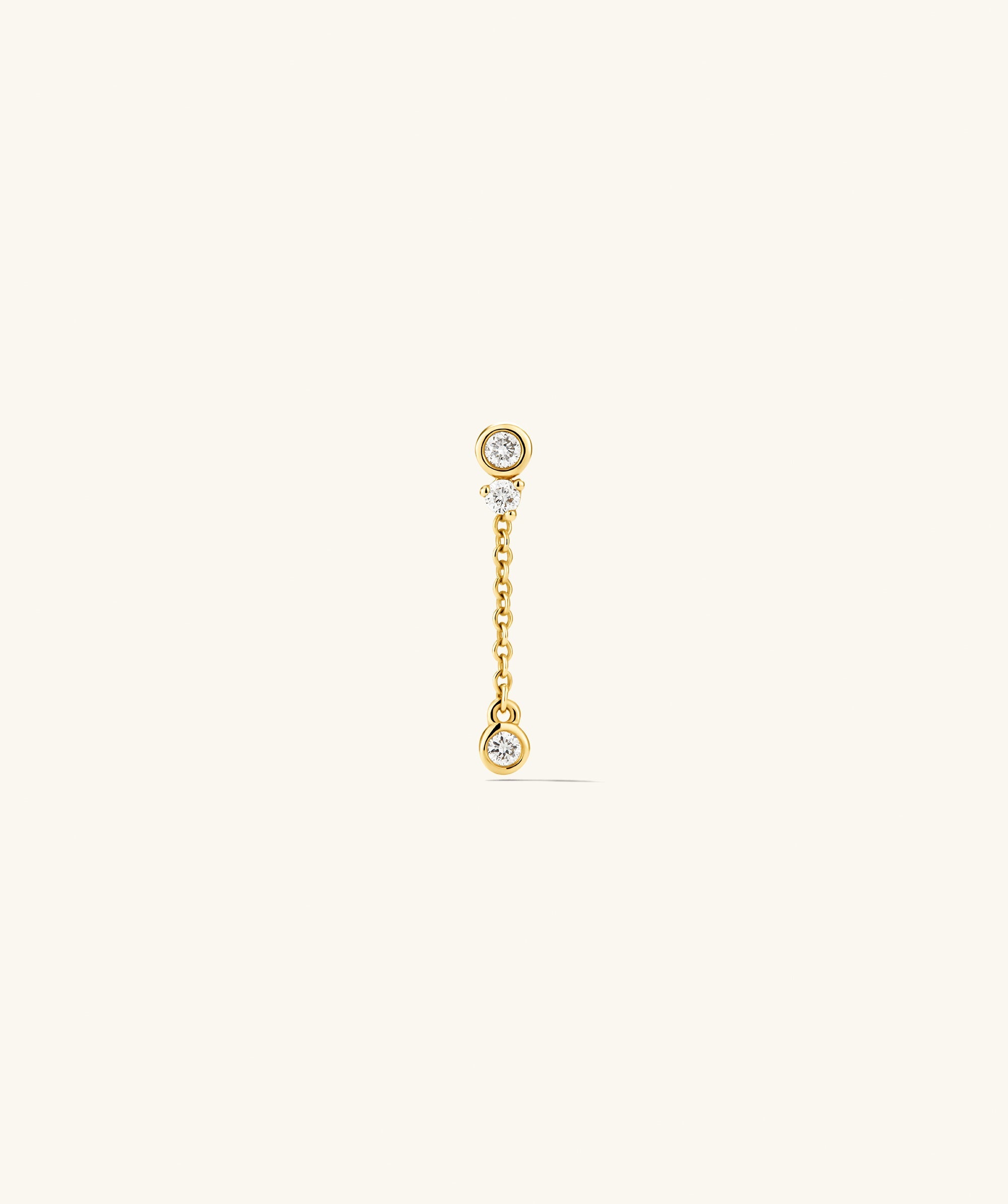 Celeste Lab Grown Diamond Chain Stud featuring clustered diamonds in bezel and prong settings, with a dangling diamond on a delicate chain, inspired by constellations.