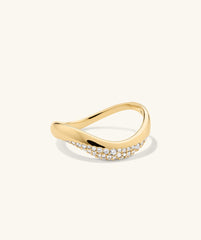 DÃ´me Figure Diamond Dipped Ring: A handcrafted 14k gold ring featuring sleek curves and pavÃ© diamonds, merging architectural design with fluid elegance.