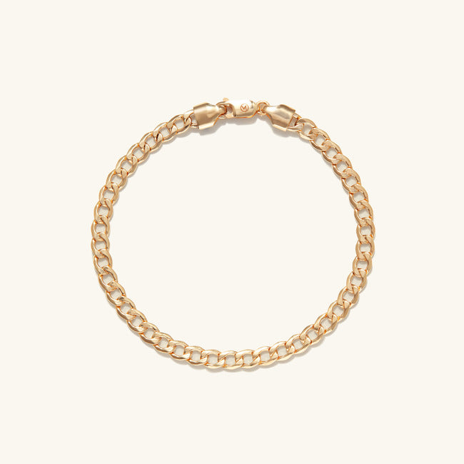 Flat Curb Chain Bracelet with clasp, a versatile gold fashion accessory designed for everyday wear, enhancing any look effortlessly.