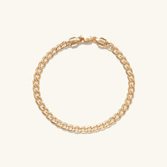 Flat Curb Chain Bracelet with clasp, a versatile gold fashion accessory designed for everyday wear, enhancing any look effortlessly.