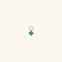 Single Gemstone Cluster Hoop Charm shown up close, highlighting its intricate design and ability to personalize and enhance everyday hoop earrings.