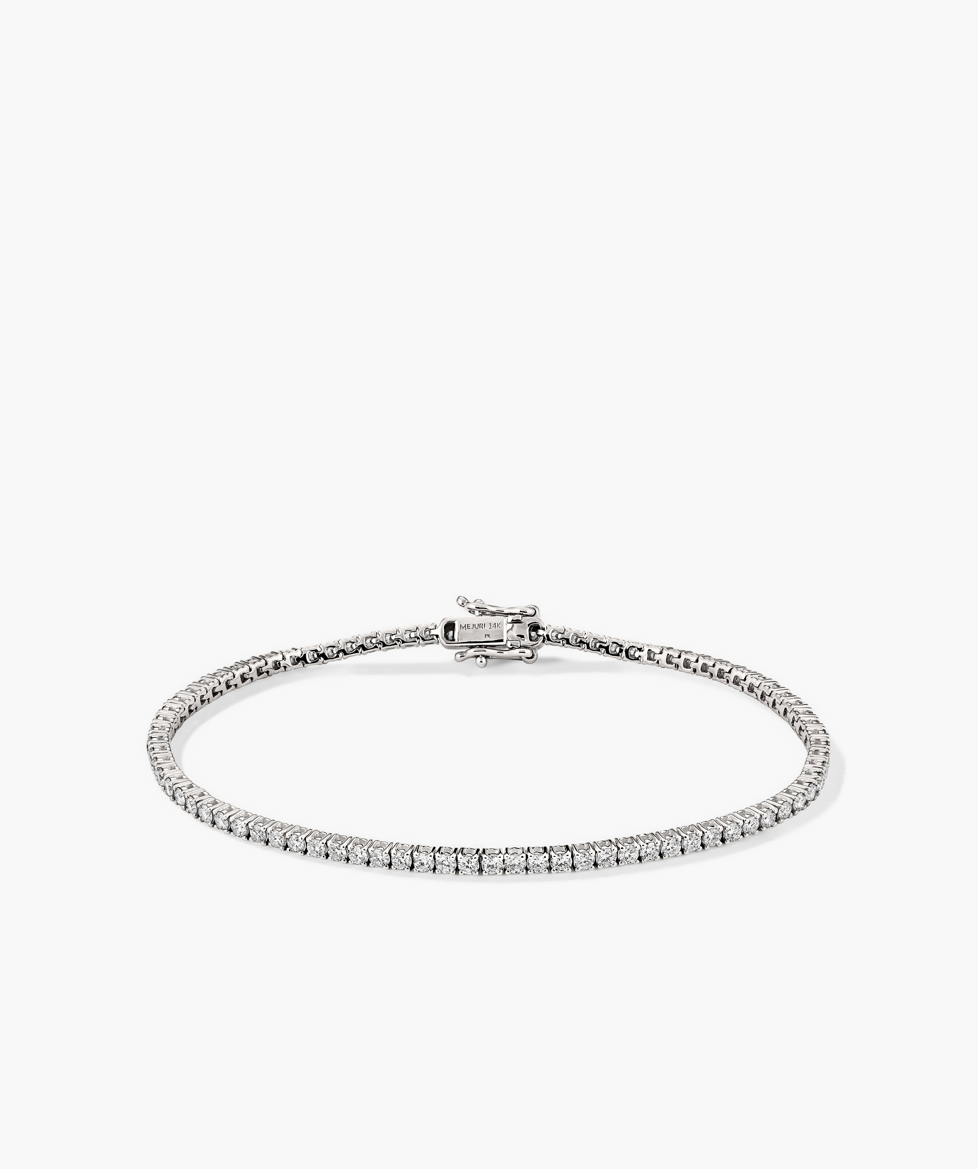 Lab Grown Diamond Tennis Bracelet 1.8mm: a close-up of a silver bracelet with small lab-grown diamonds, showcasing its intricate design and secure clasp mechanism.