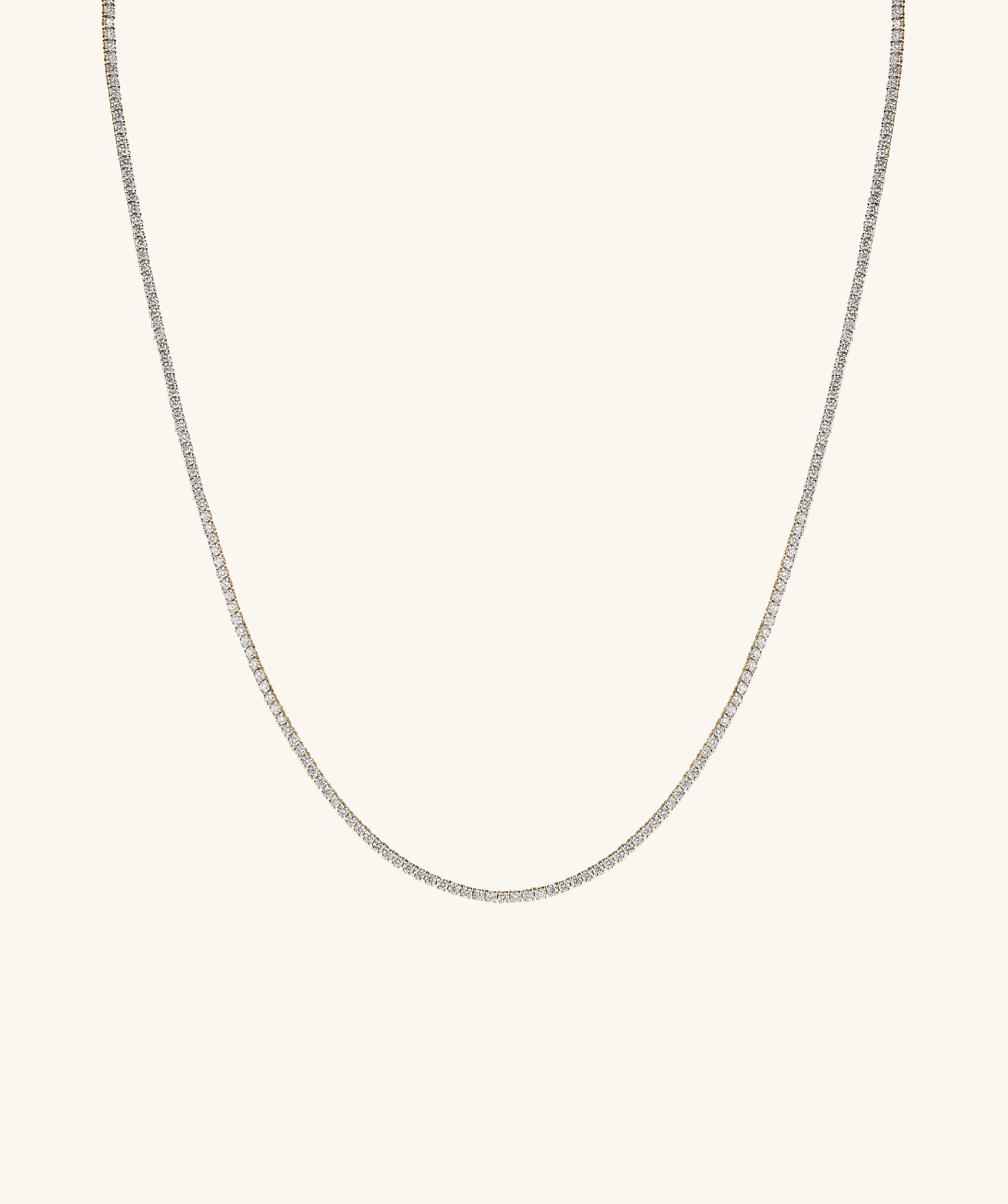 Lab Grown Diamond Tennis Necklace 1.8mm, featuring a close-up of a delicate 14k gold chain adorned with sparkling lab grown diamonds.