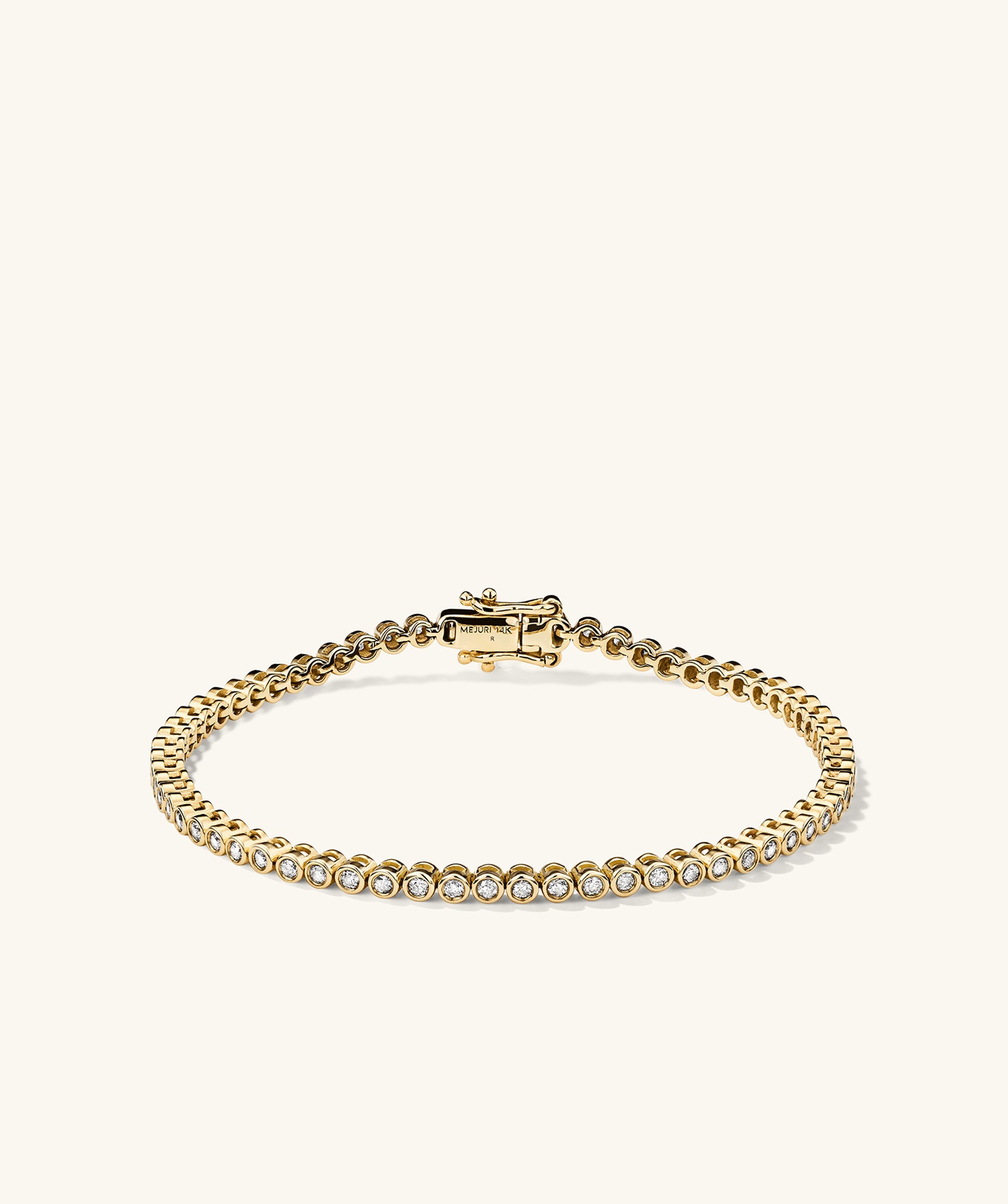 Bezel Lab Grown Diamond Tennis Bracelet featuring bezel-set lab grown diamonds, handcrafted in 14k solid gold, offering a sparkling, ethical, and high-value fashion accessory.