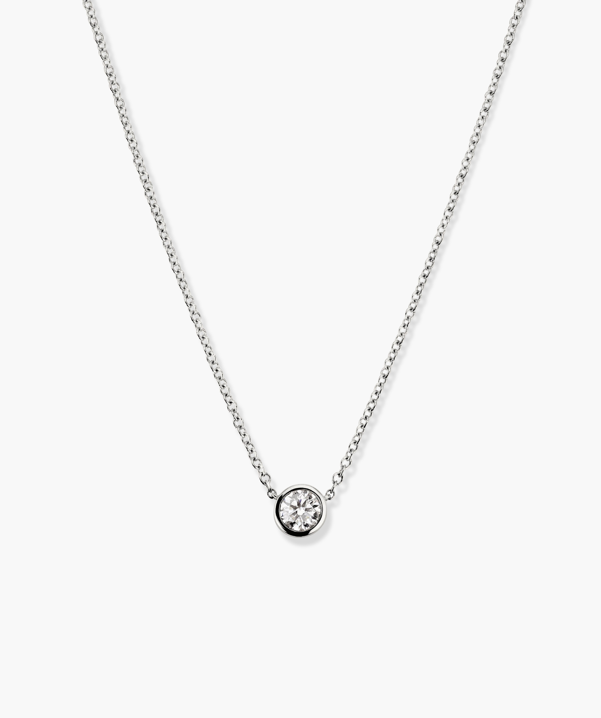Bezel Lab Grown Diamond Necklace: A close-up of a 14k solid gold necklace featuring a bezel-set lab grown diamond pendant on a delicate chain.