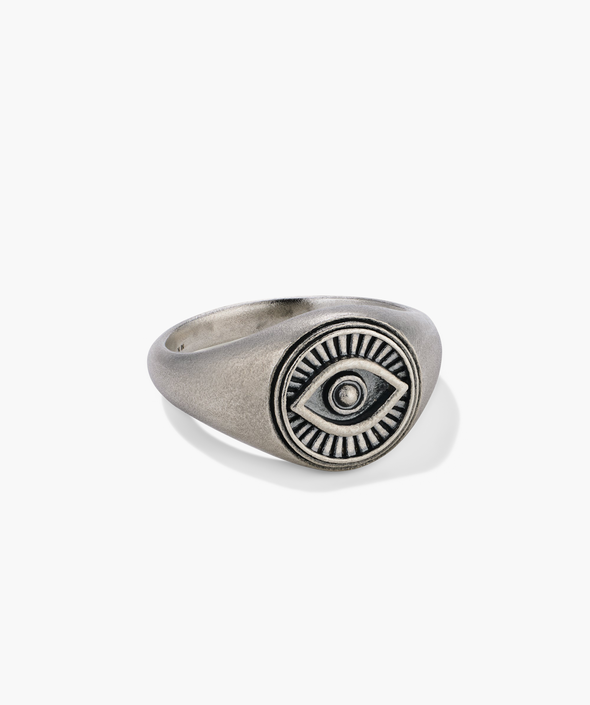 Courage Signet Ring: Silver ring featuring a central eye design, symbolizing protection against envy and evil.