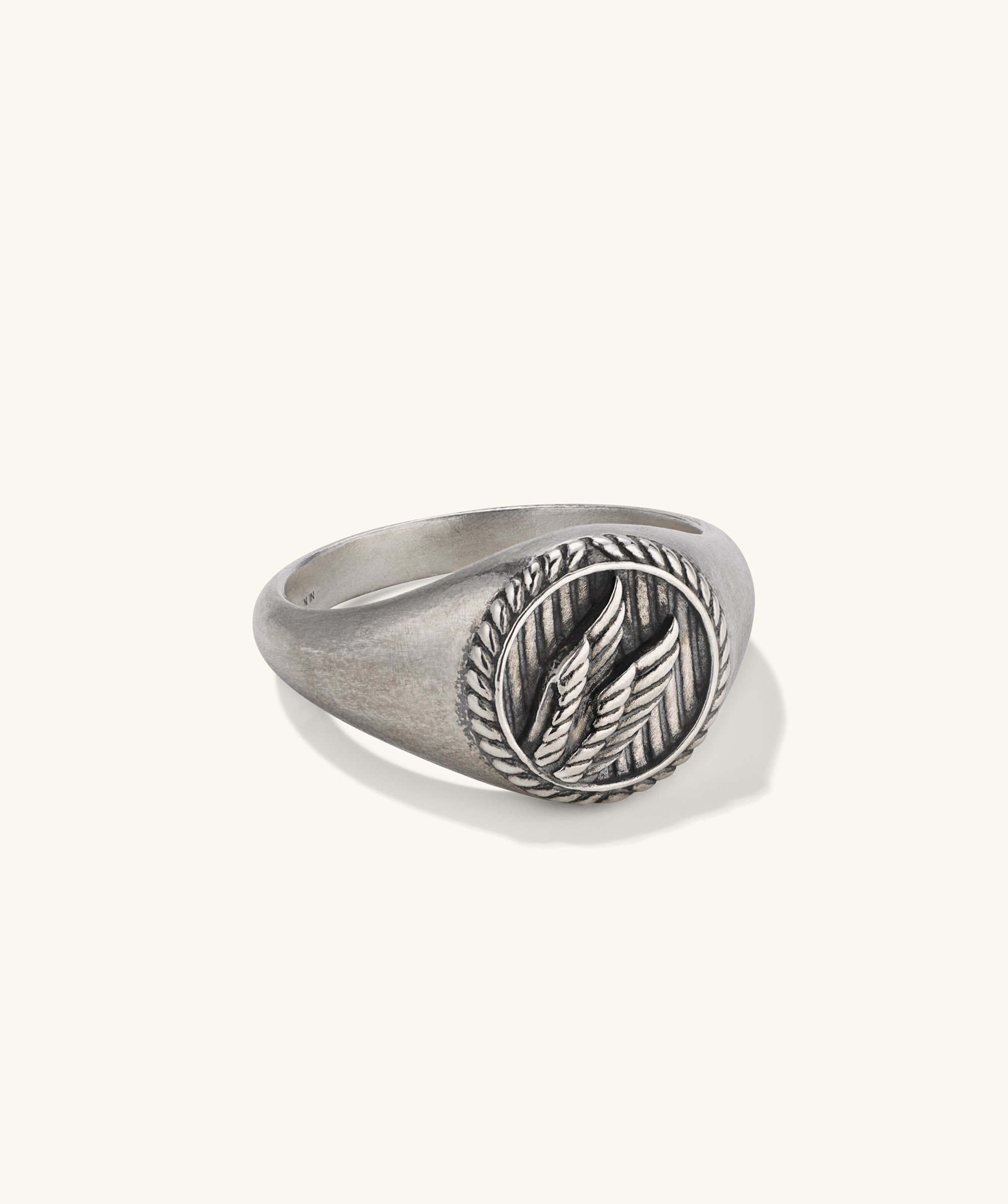 Victory Signet Ring featuring silver wings, symbolizing strength and agility, inspired by Nike, the Greek goddess of victory.