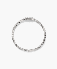 Lab Grown Sapphire Tennis Bracelet: A close-up of a silver bracelet adorned with lab grown sapphires, showcasing its elegant design and sparkling gemstones.