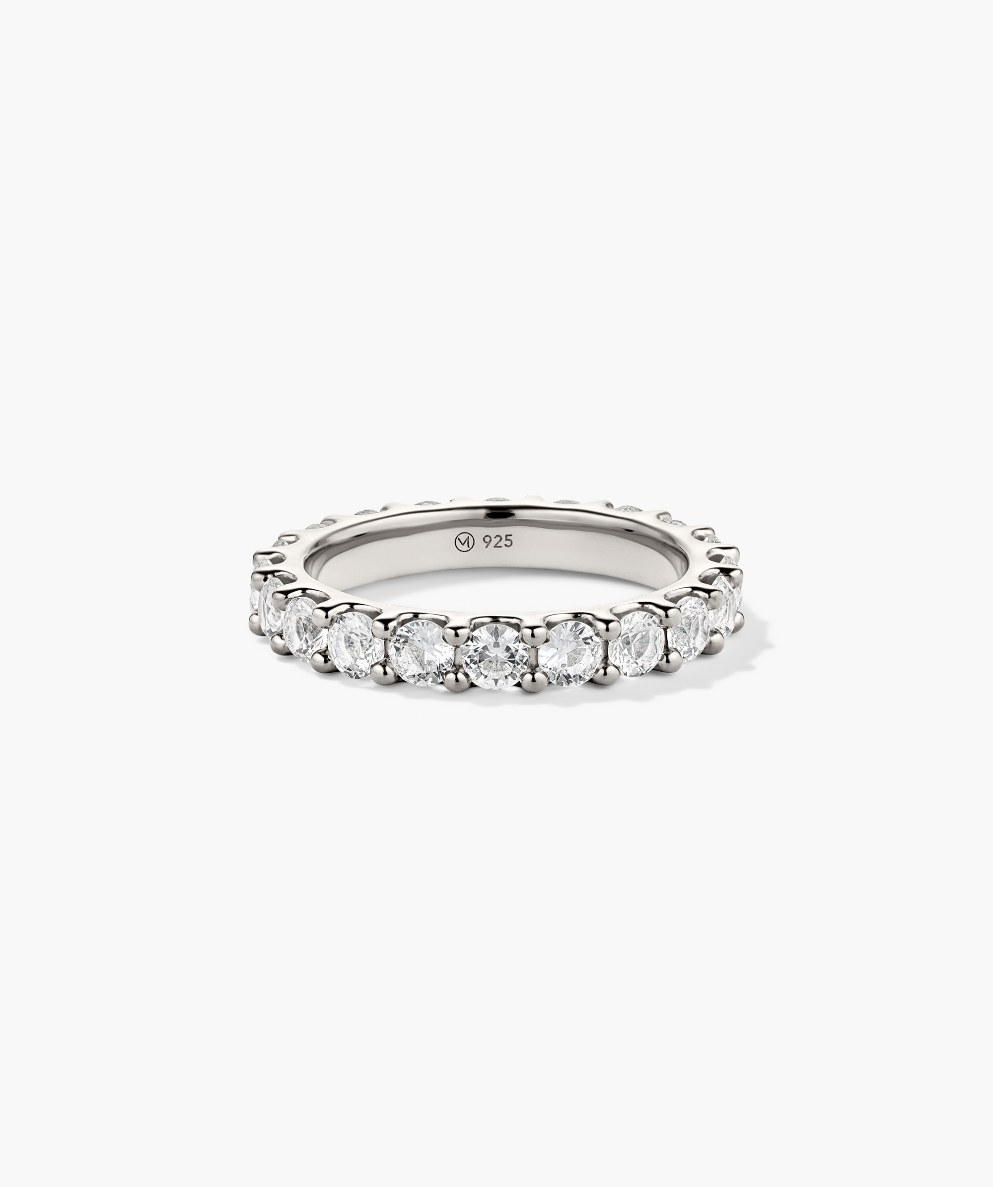 Aurora Lab Grown Sapphire Eternity Ring showcasing sparkling diamonds and sapphires set in a sleek platinum band, highlighted in a close-up view.