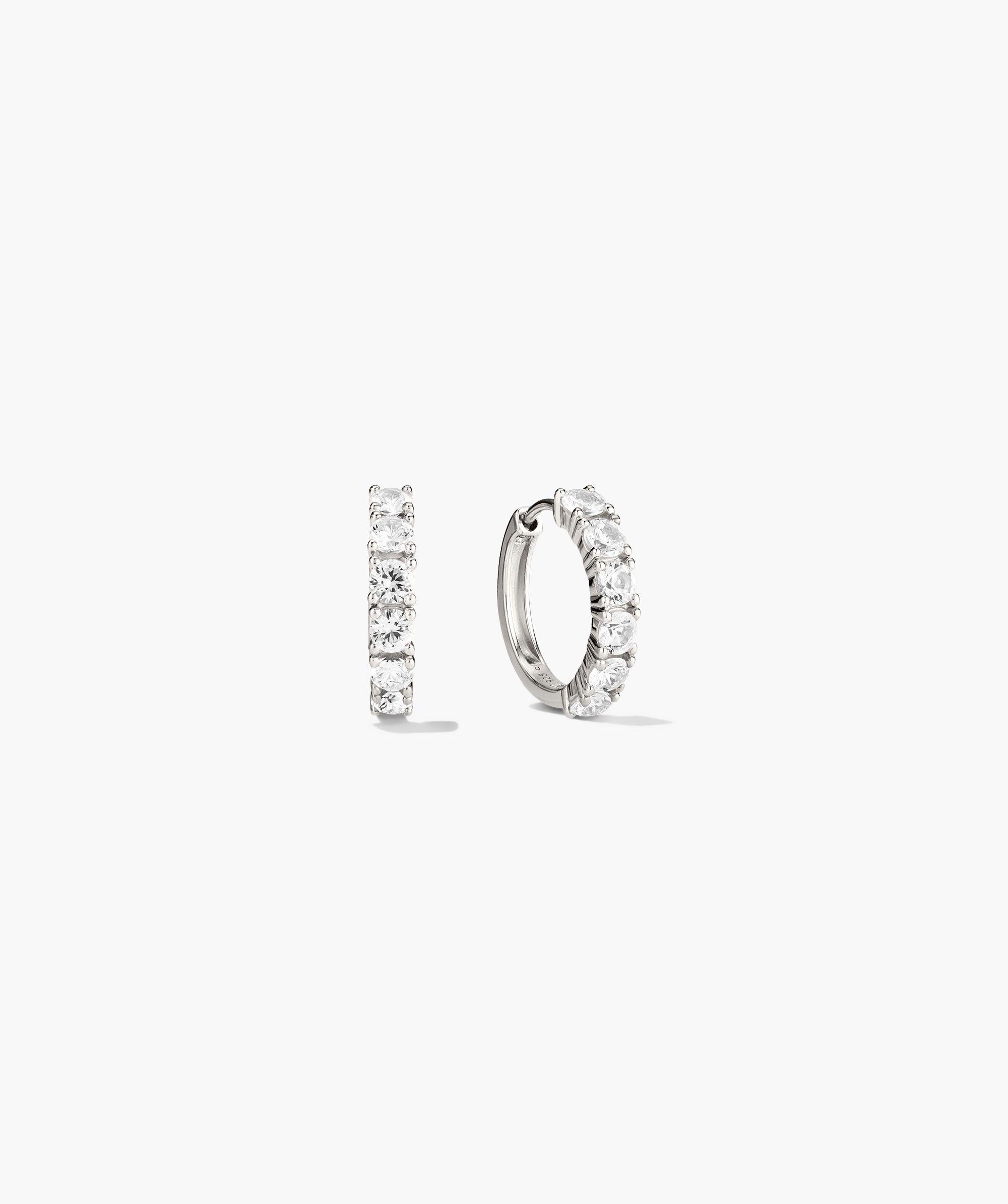 Lab Grown Sapphire Small Hoops, intricately designed earrings, portrayed in a detailed sketch, emphasizing their shiny, slightly larger size than typical huggies.