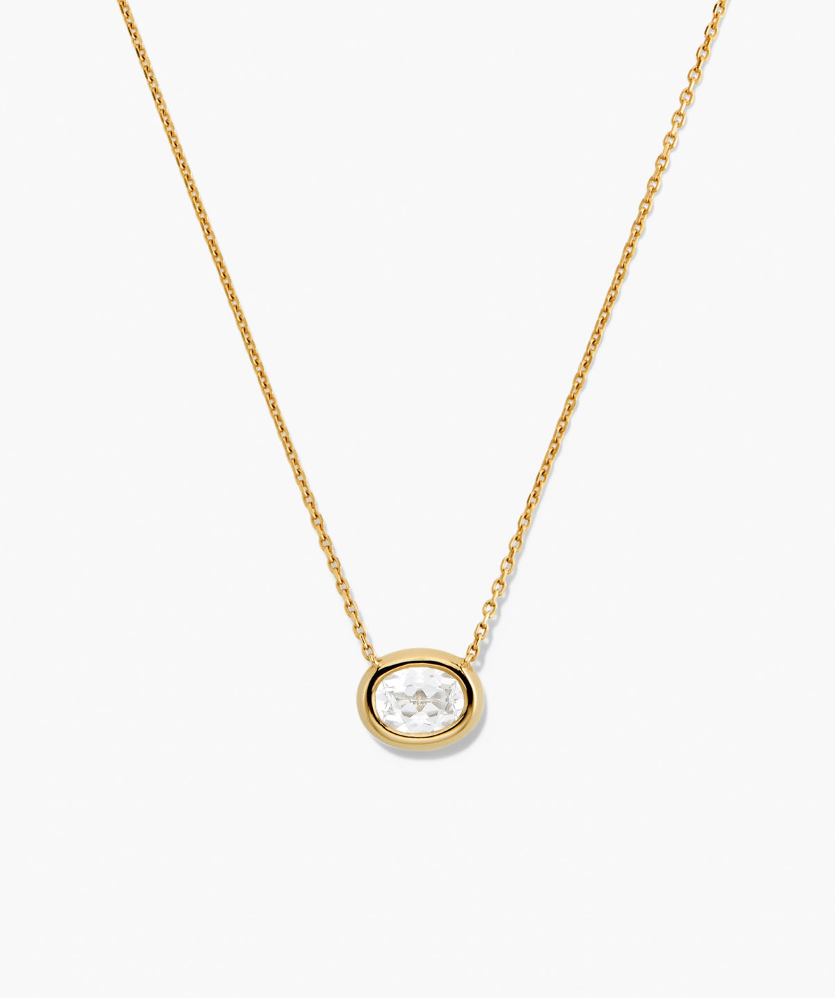 Lucia Necklace: A delicate gold chain featuring an oval bezel-set lab-grown sapphire pendant, perfect as a signature piece for any ensemble.