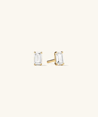 Lab Grown Sapphire Emerald Cut Studs, featuring a classic design with square-cut sapphire stones, perfect for wearing alone or stacking.