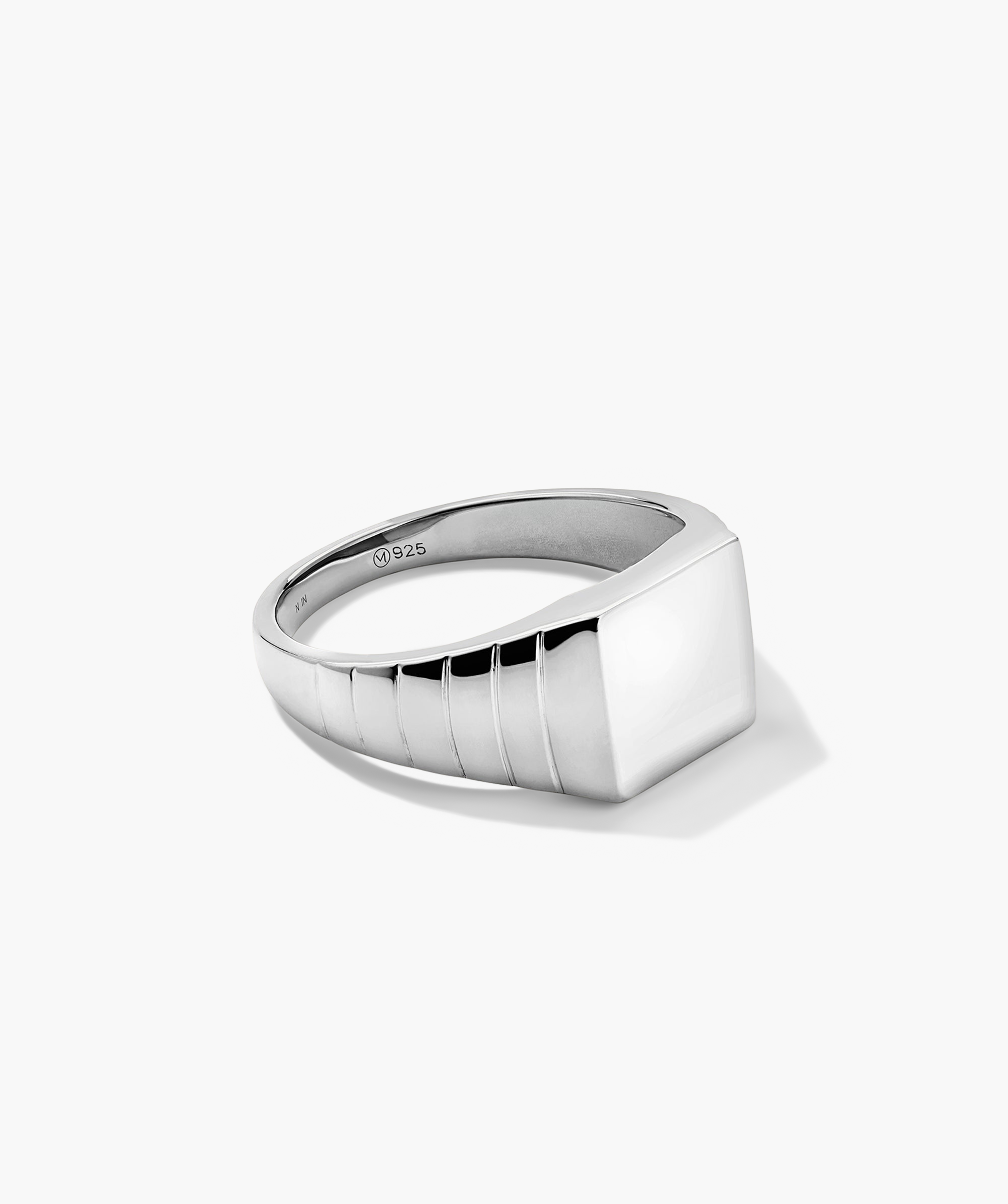 Square Signet Ring: A bold silver ring featuring a sleek square design, perfect for adding a statement piece to your jewelry collection.