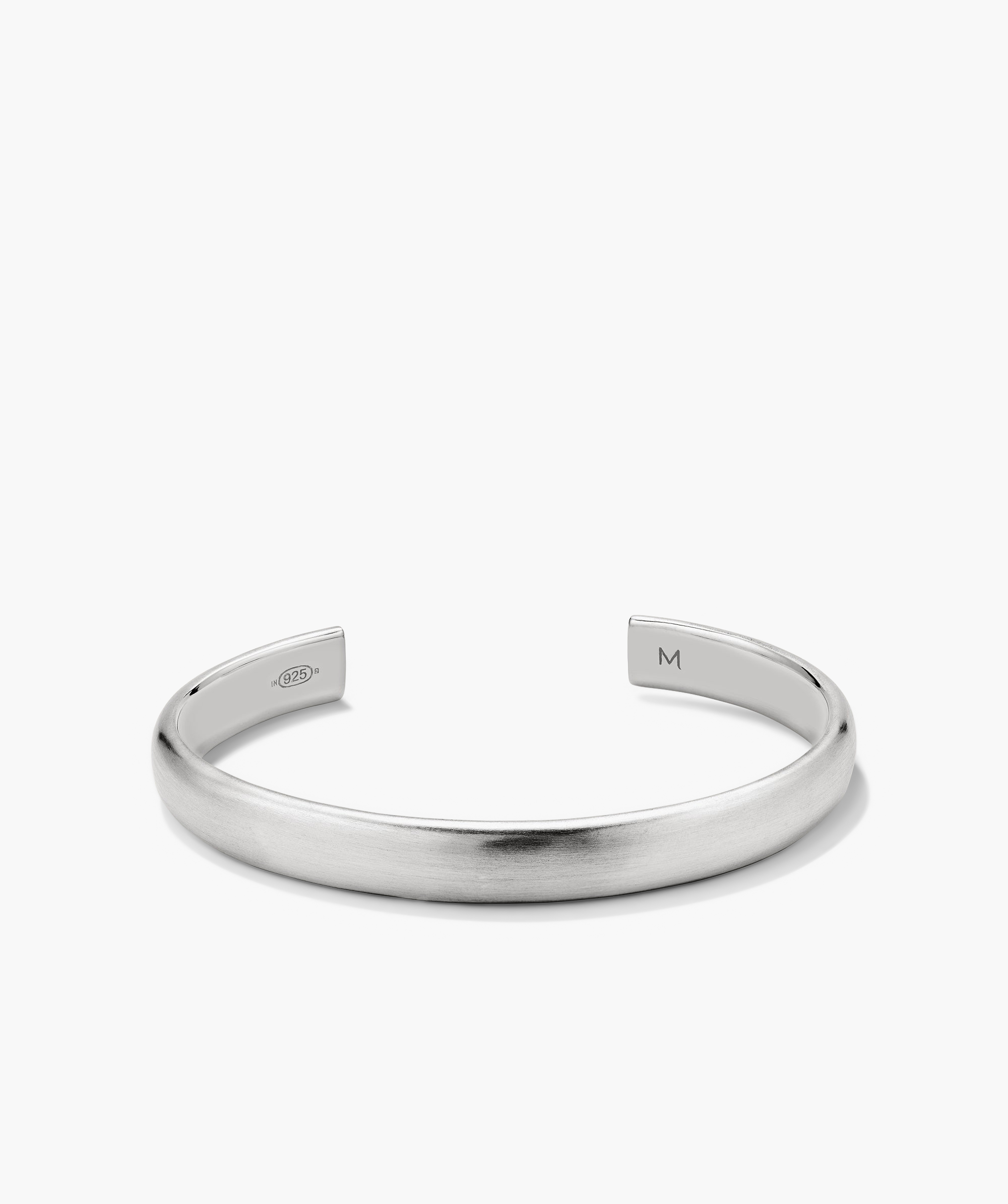 Bold Cuff: A silver bracelet featuring a sleek, square-shaped design, offering a simple yet bold silhouette that complements any outfit.