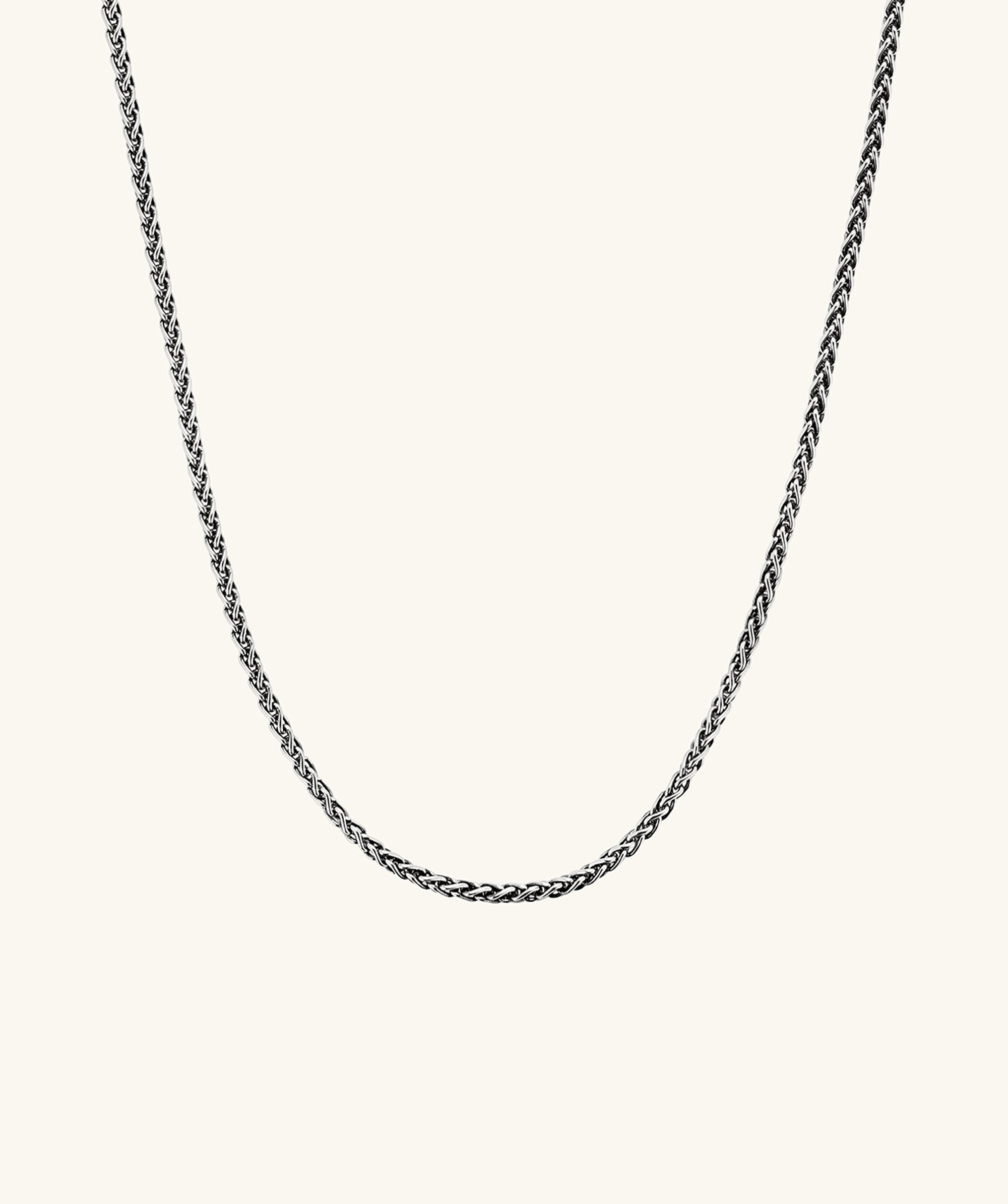 2.4mm Wheat Chain Necklace, intricately woven and handcrafted in oxidized sterling silver, showcasing a detailed close-up of the chain's texture and design.