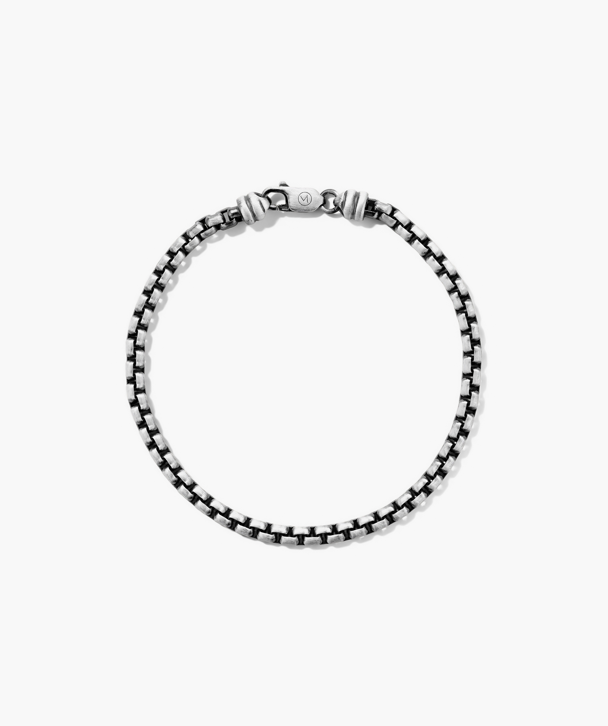 Silver chain bracelet with a clasp, designed for everyday wear. Complements the Round Box Chain Necklace.