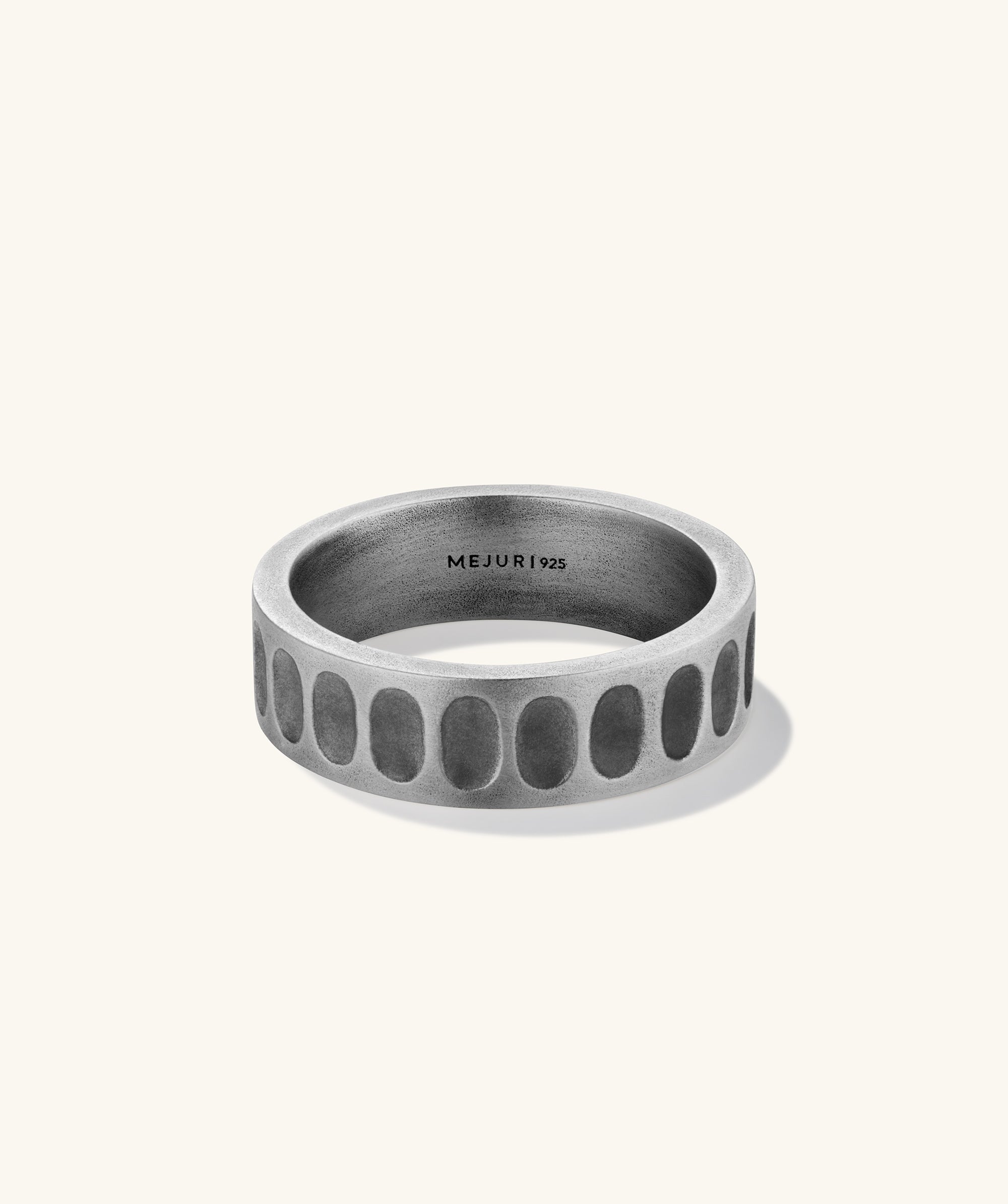 Colosseum Ring featuring strong, bold design with inverted impressions and oval shapes, inspired by classic architecture, crafted in silver or platinum.