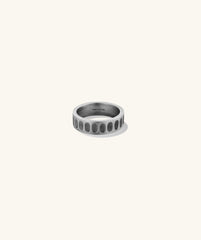 Colosseum Ring with inverted impression designs, inspired by classic architecture and organic shapes, showcasing a strong yet refined band.