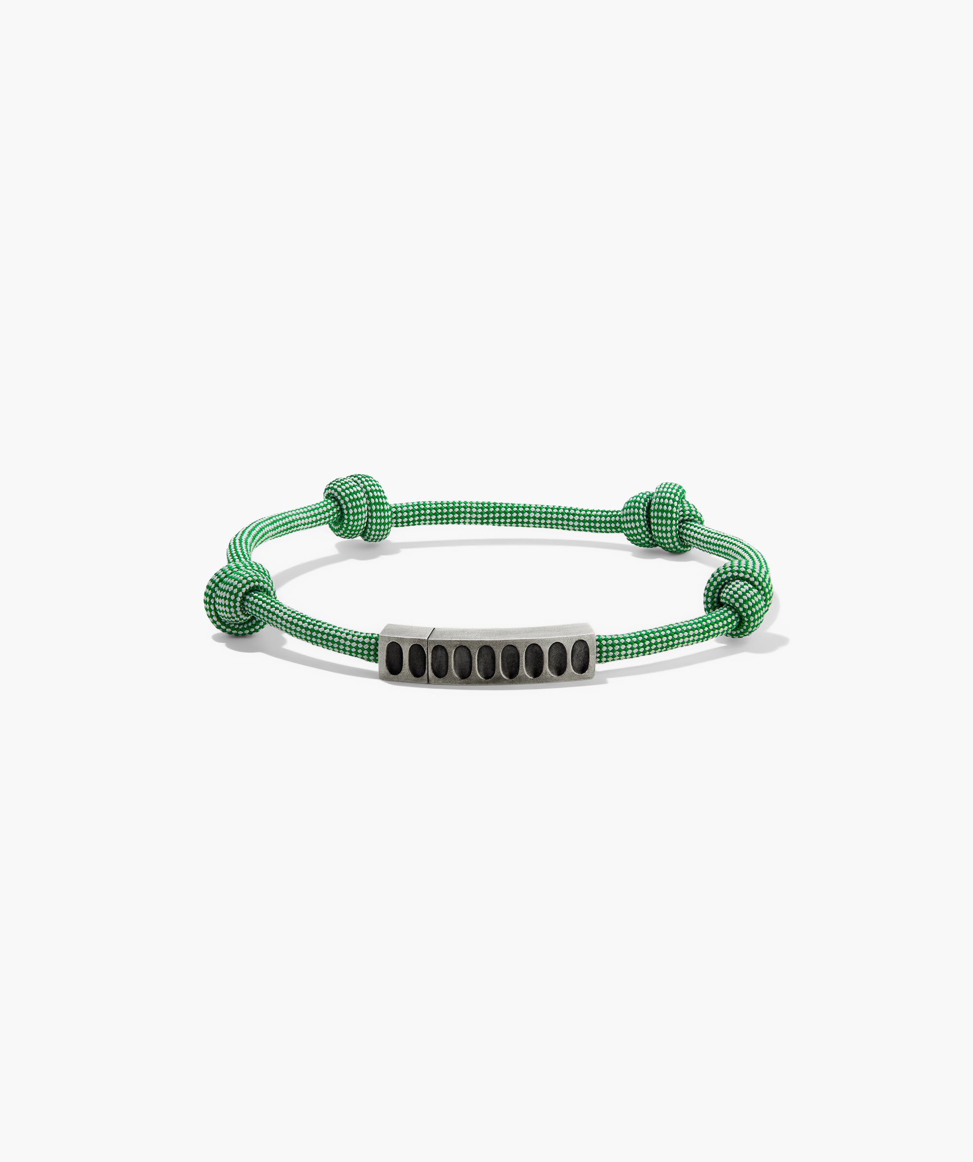 Colosseum Cord Bracelet featuring a striking metal and cord design, inspired by the Charlotte collection, ideal for adventurous outings.