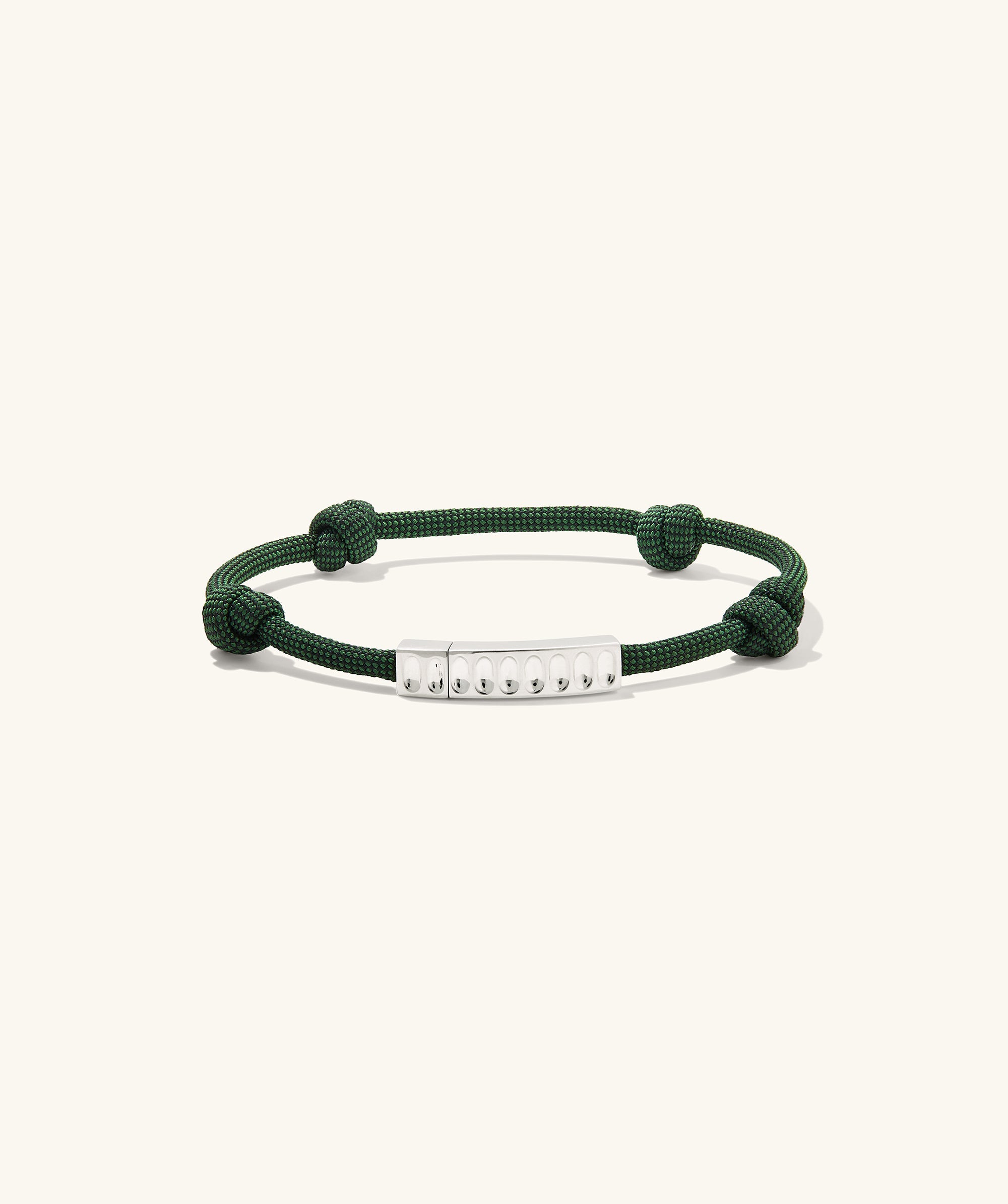 Colosseum Cord Bracelet showcasing a striking metal and cord design, part of the Charlotte collection, perfect for adventurous wear.