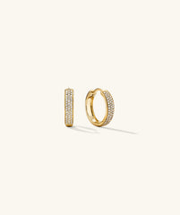 Bold PavÃ© Diamond Small Hoops: Handcrafted 14k gold earrings featuring responsibly sourced diamonds, designed to attract compliments with their elegant sparkle.
