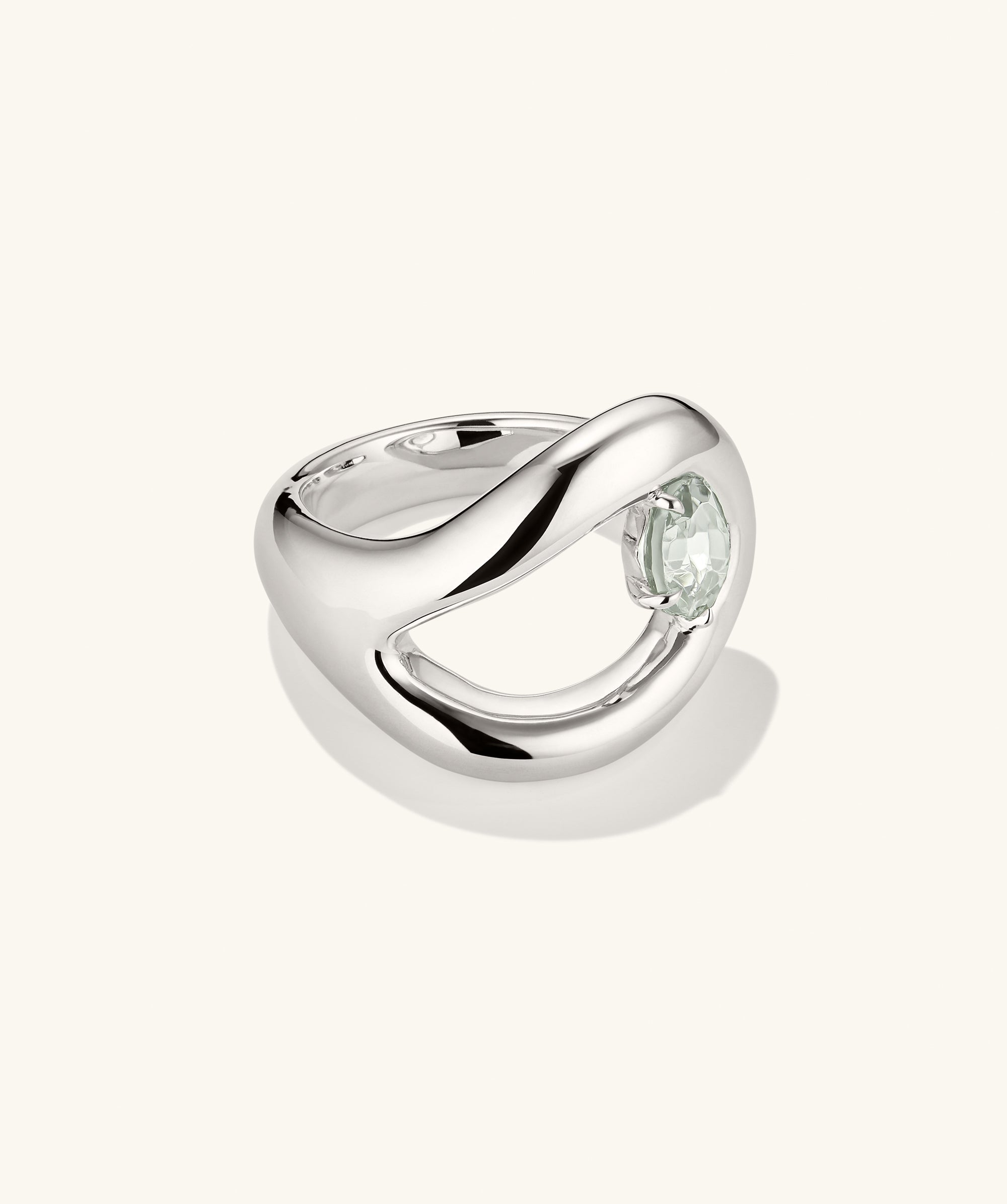 Organic DÃ´me Curve Gemstone Ring featuring a silver band with a prominent faceted stone, showcasing elegant curves and artistic design for a sophisticated ring stack.
