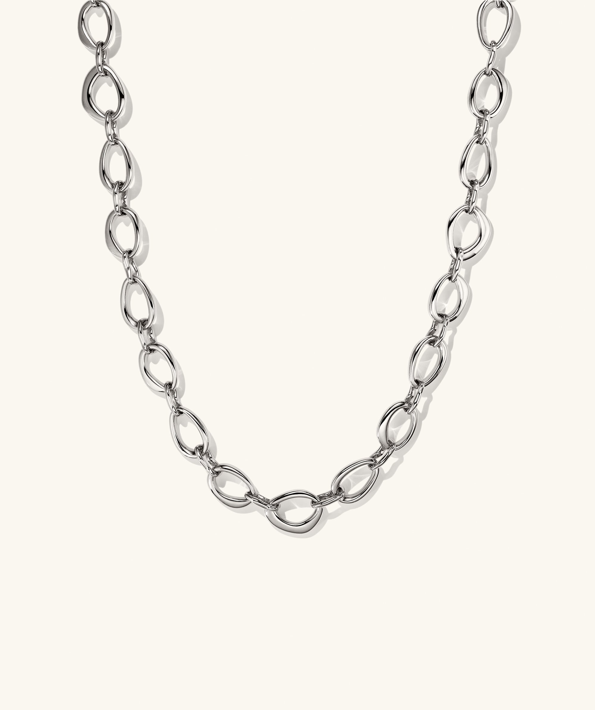 Organic DÃ´me Ripple Chain Necklace featuring irregular silver oval links with a toggle clasp, offering a fluid, dynamic design from the iconic DÃ´me collection.