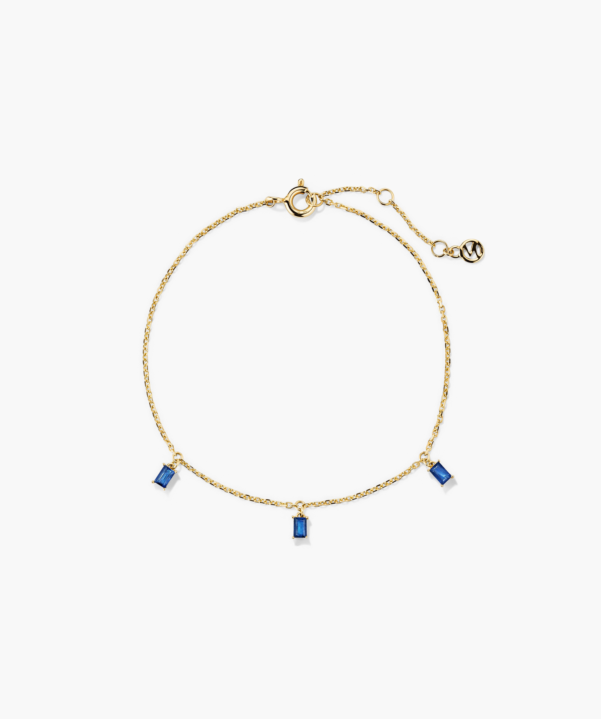 Baguette Gemstone Bracelet: Gold chain bracelet featuring blue stones, perfect for enhancing your jewelry stack with an elegant touch.