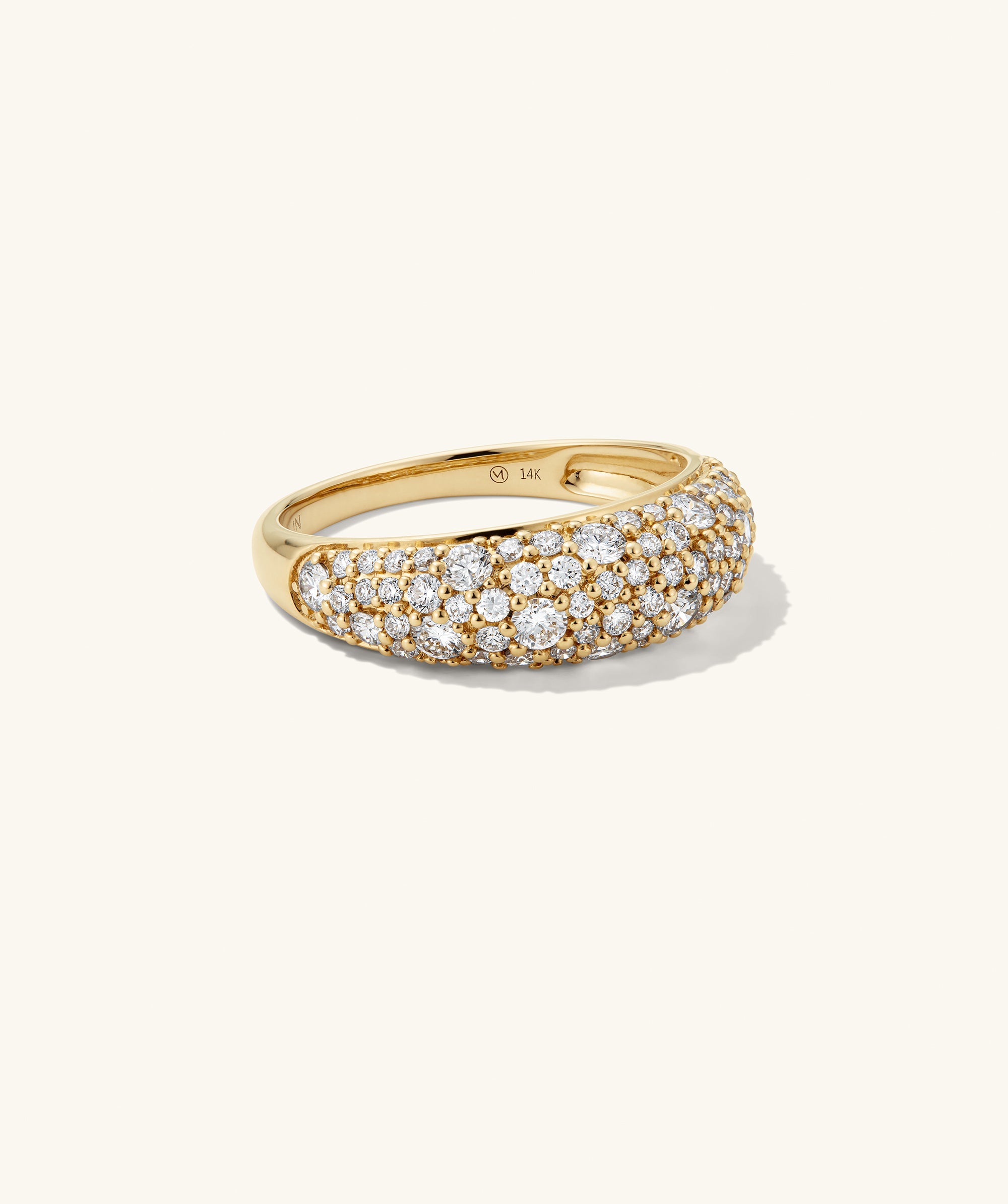 DÃ´me PavÃ© Lab Grown Diamond Ring featuring a dense cobblestone setting of various sized lab-grown diamonds, enhancing its smooth, continuous sparkle.