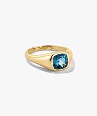 Jude Pinky Signet Ring features a 14K yellow-gold band with a cushion-cut blue gemstone, engraved inside with âMEJURI 14k.â