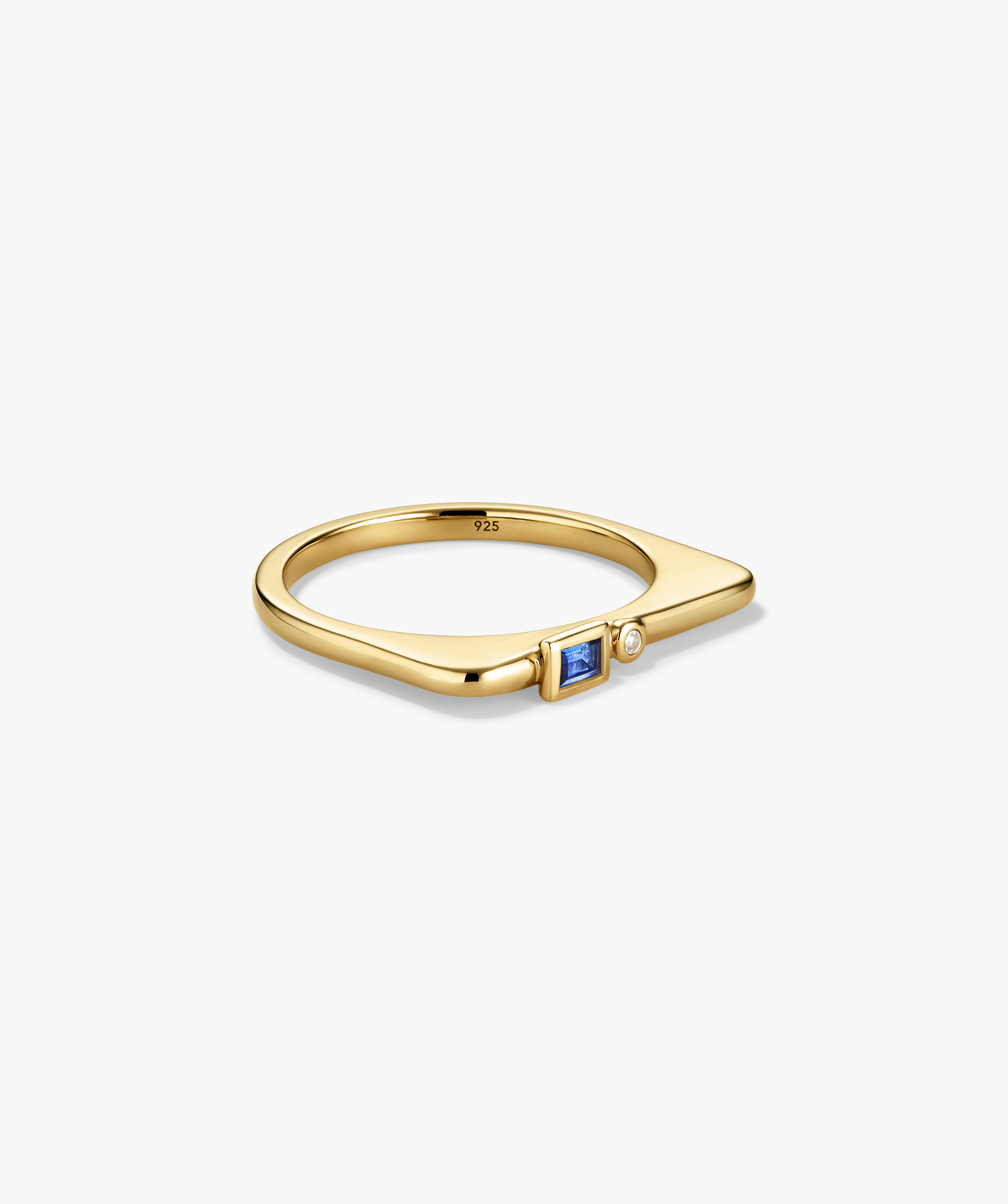 Puzzle Stacking Ring features a gold-tone V-shaped band with a square-cut blue stone and a small white gem, stamped 925 inside.