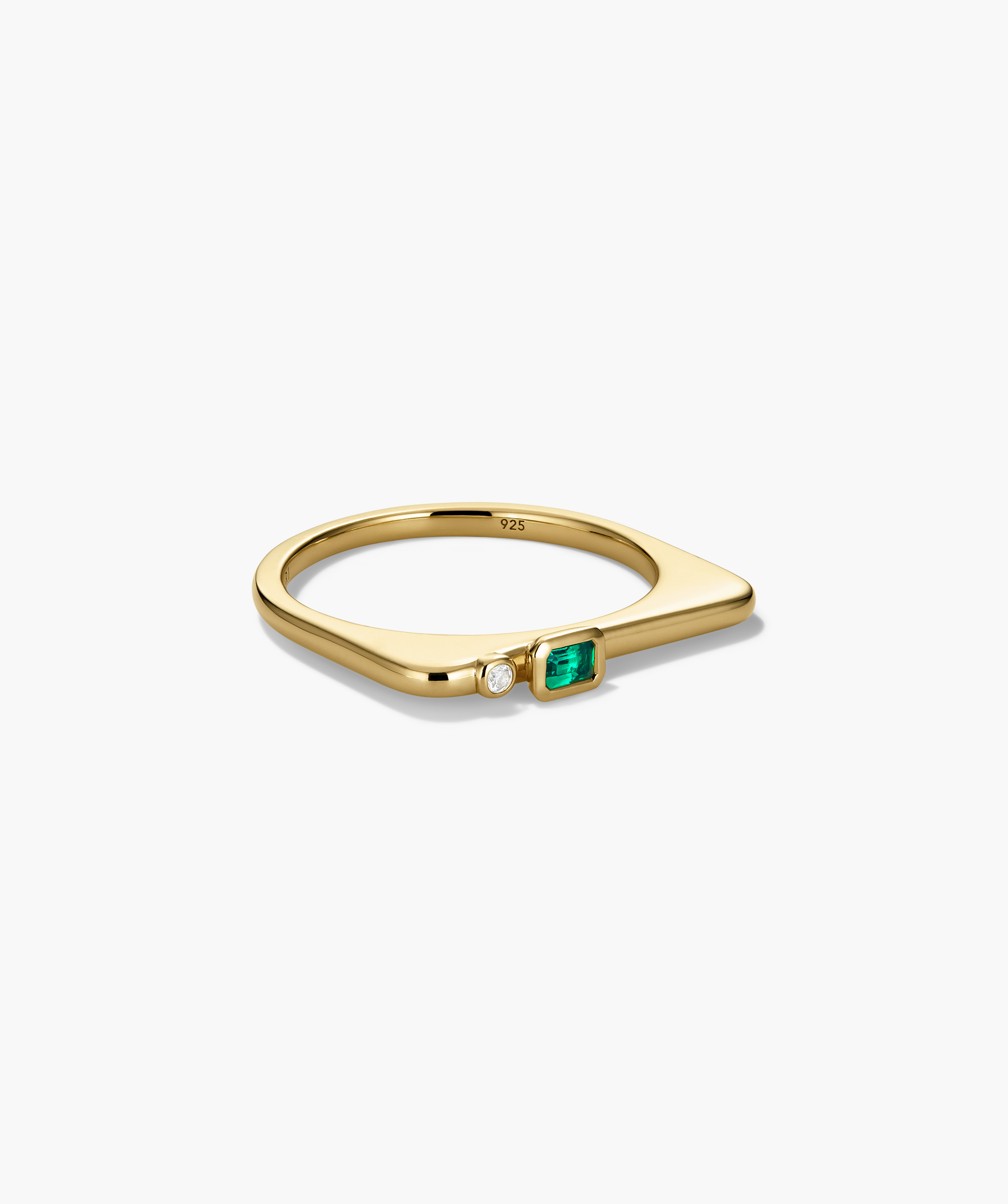 Puzzle Stacking Ring with a gold-plated band features an emerald-cut green gem and a round white stone, perfect for creating personalized combinations.