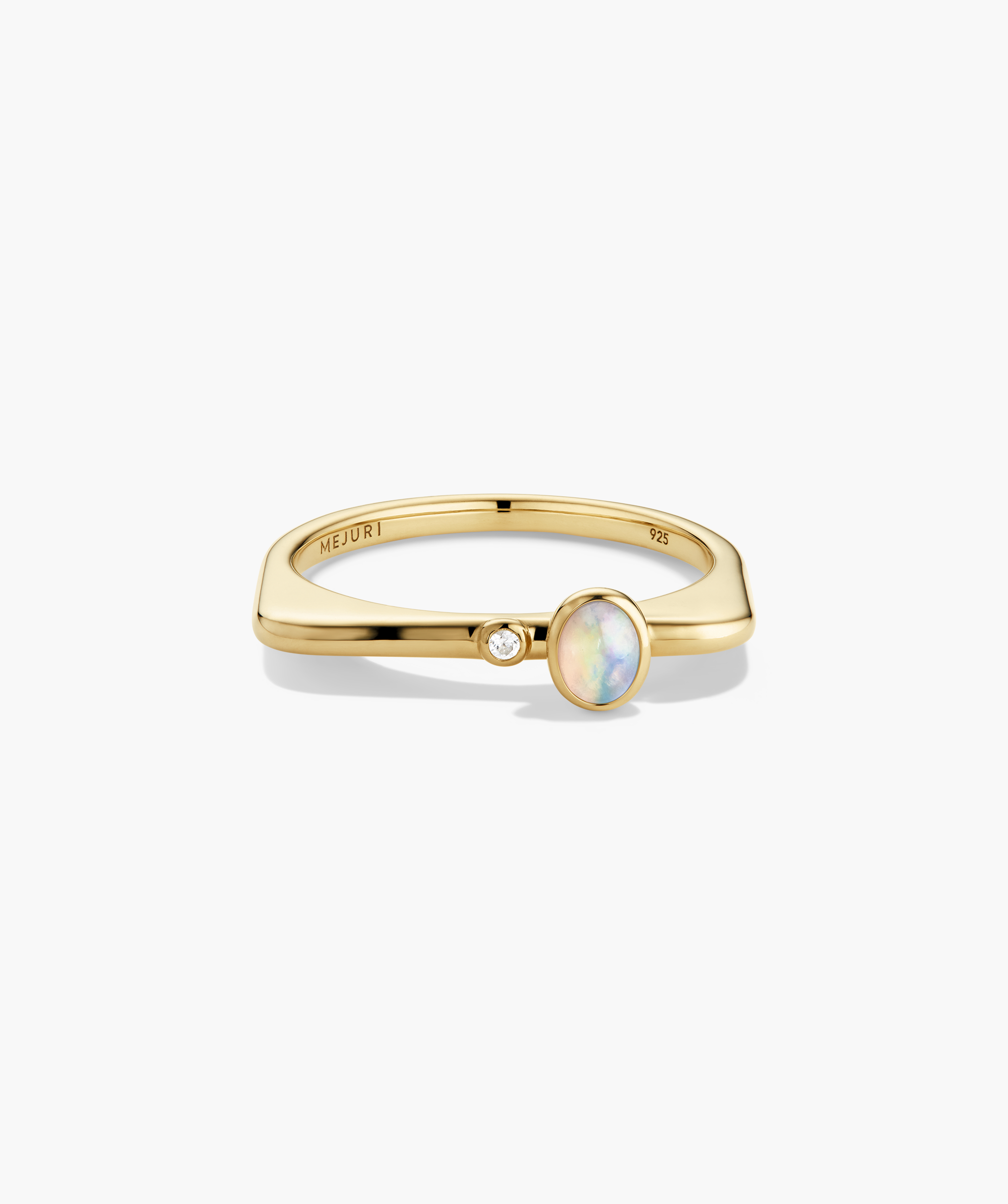 Puzzle Stacking Ring: A squared-off band with a bezel-set diamond and an opal, crafted in gold-plated sterling silver, engraved with MEJURI and 925.