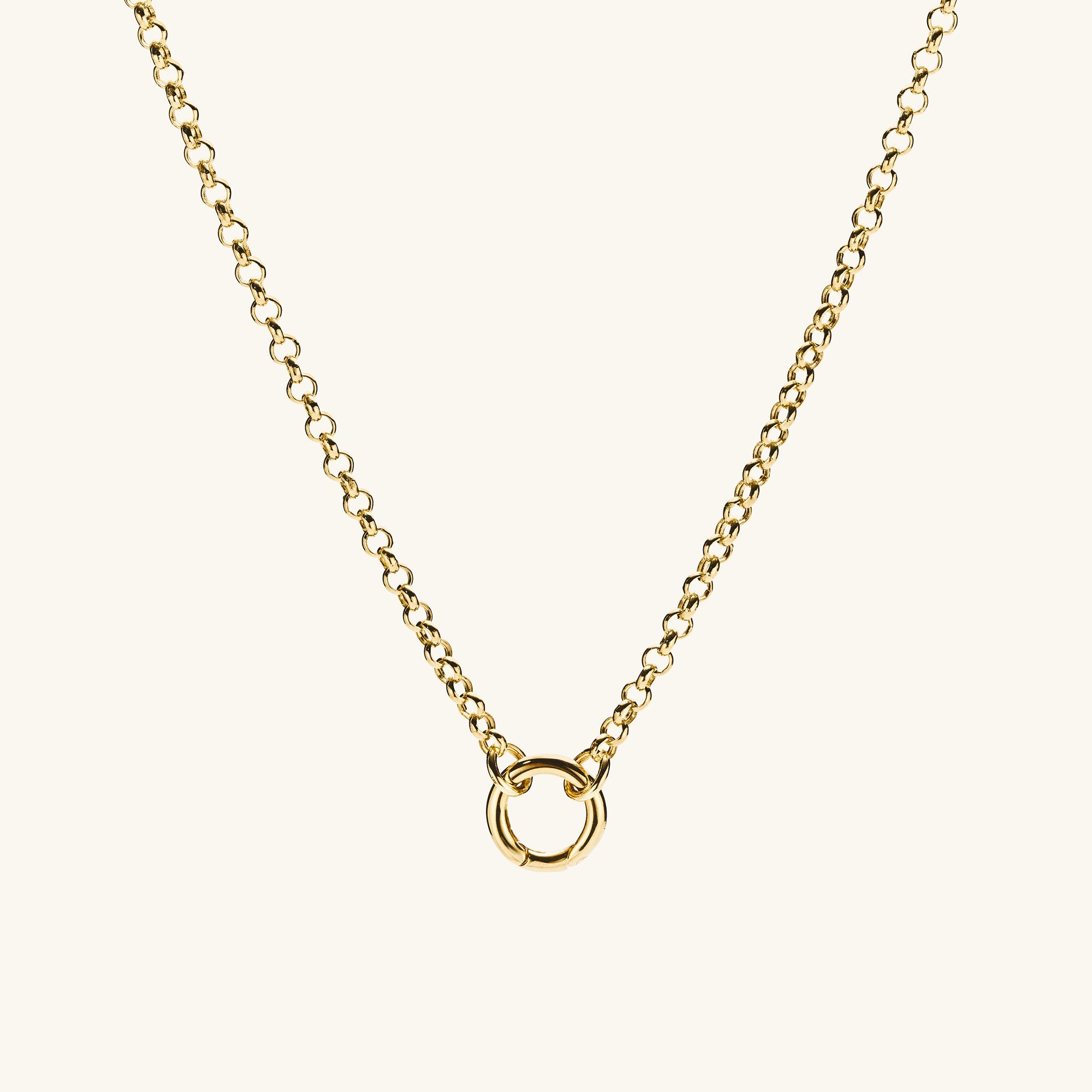 Rolo Chain Charm Necklace: A close-up of a 14k solid gold chain featuring a ring, designed to layer three charms with the Stacker Clasp.