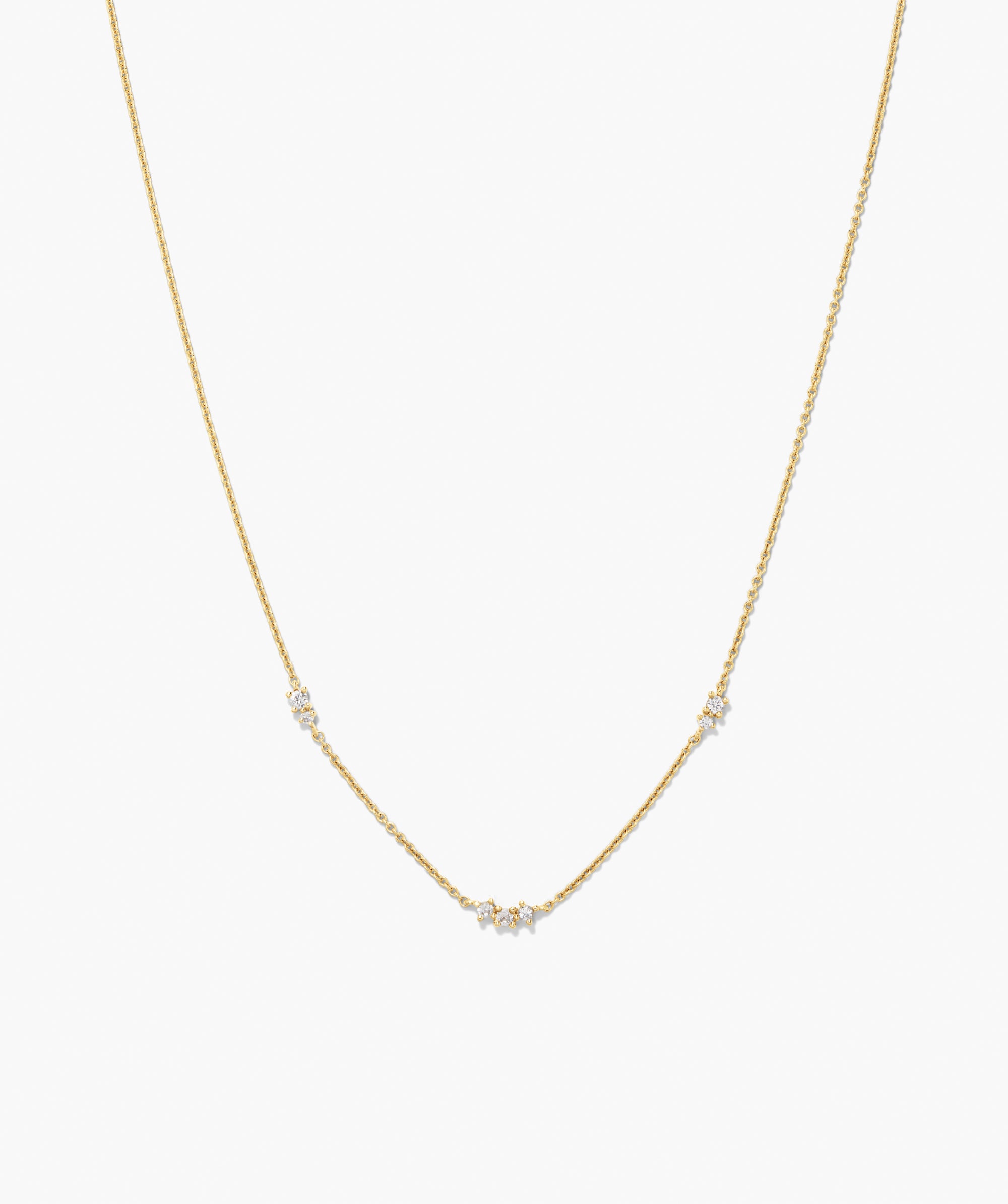 Floating Lab Grown Sapphire Necklace: A minimalist yellow-gold chain with three gemstone clusters, offering a refined sparkle for any outfit.