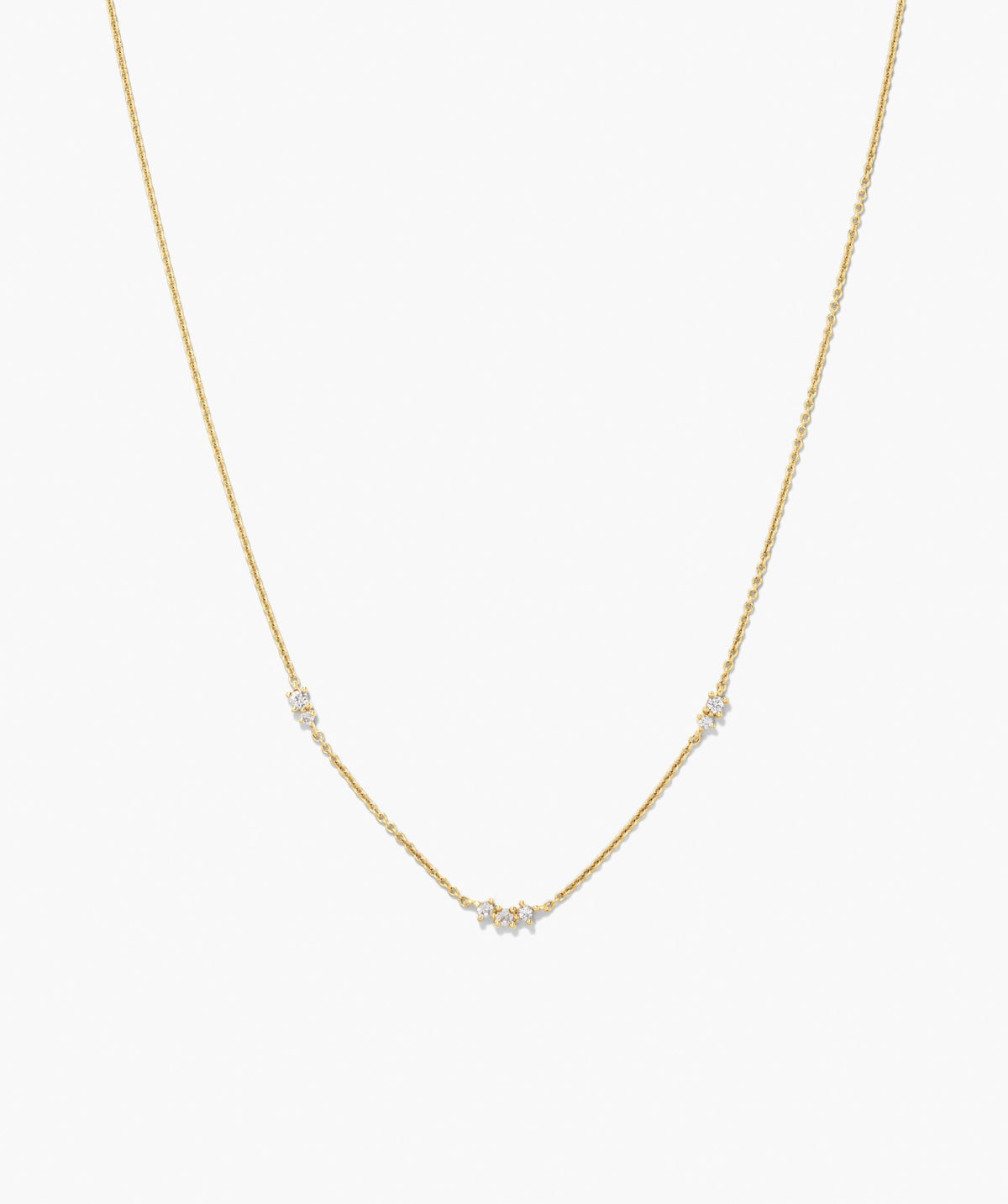 Floating Lab Grown Sapphire Necklace: A minimalist yellow-gold chain with three gemstone clusters, offering a refined sparkle for any outfit.