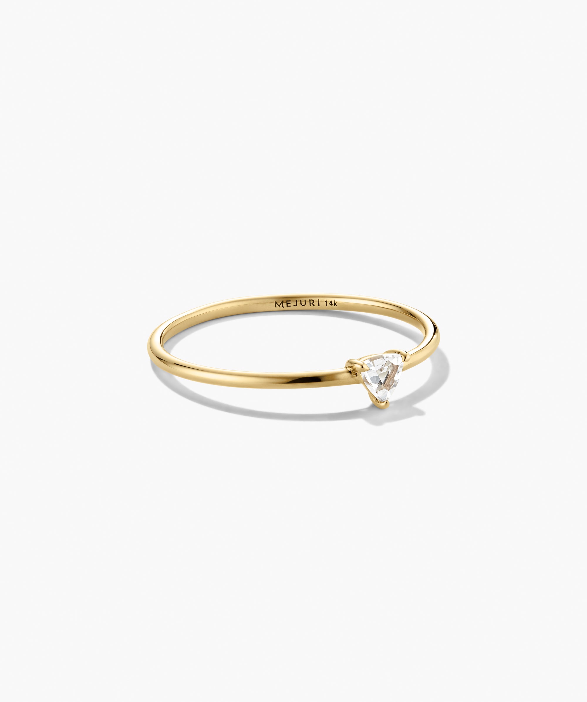 Gemstone Trillion Stacker Ring in 14k gold, featuring a trilliant white topaz in a minimalist three-prong setting on a slender polished band.