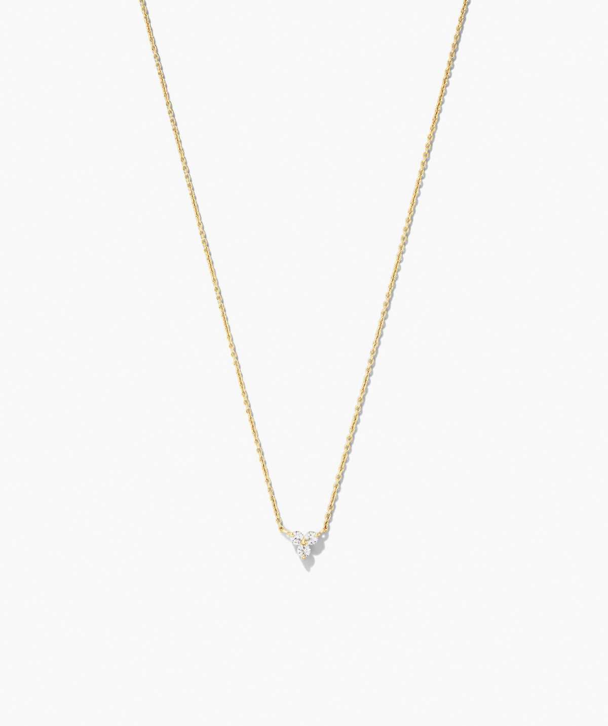Lotus Necklace (Copy): A delicate yellow-gold chain featuring a small pendant with three sparkling stones in a triangular cluster for versatile elegance.