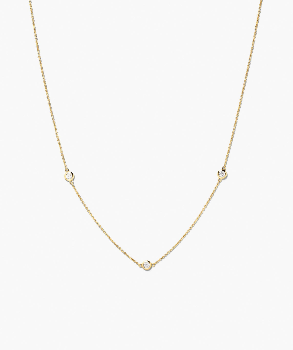 Satellite Necklace: A delicate vermeil chain with three bezel-set white sapphires, arranged for a minimalist, station-style look, perfect for any outfit.
