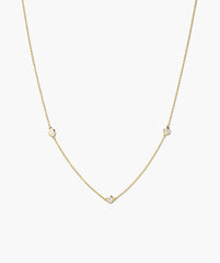 Satellite Necklace: A delicate vermeil chain with three bezel-set white sapphires, arranged for a minimalist, station-style look, perfect for any outfit.