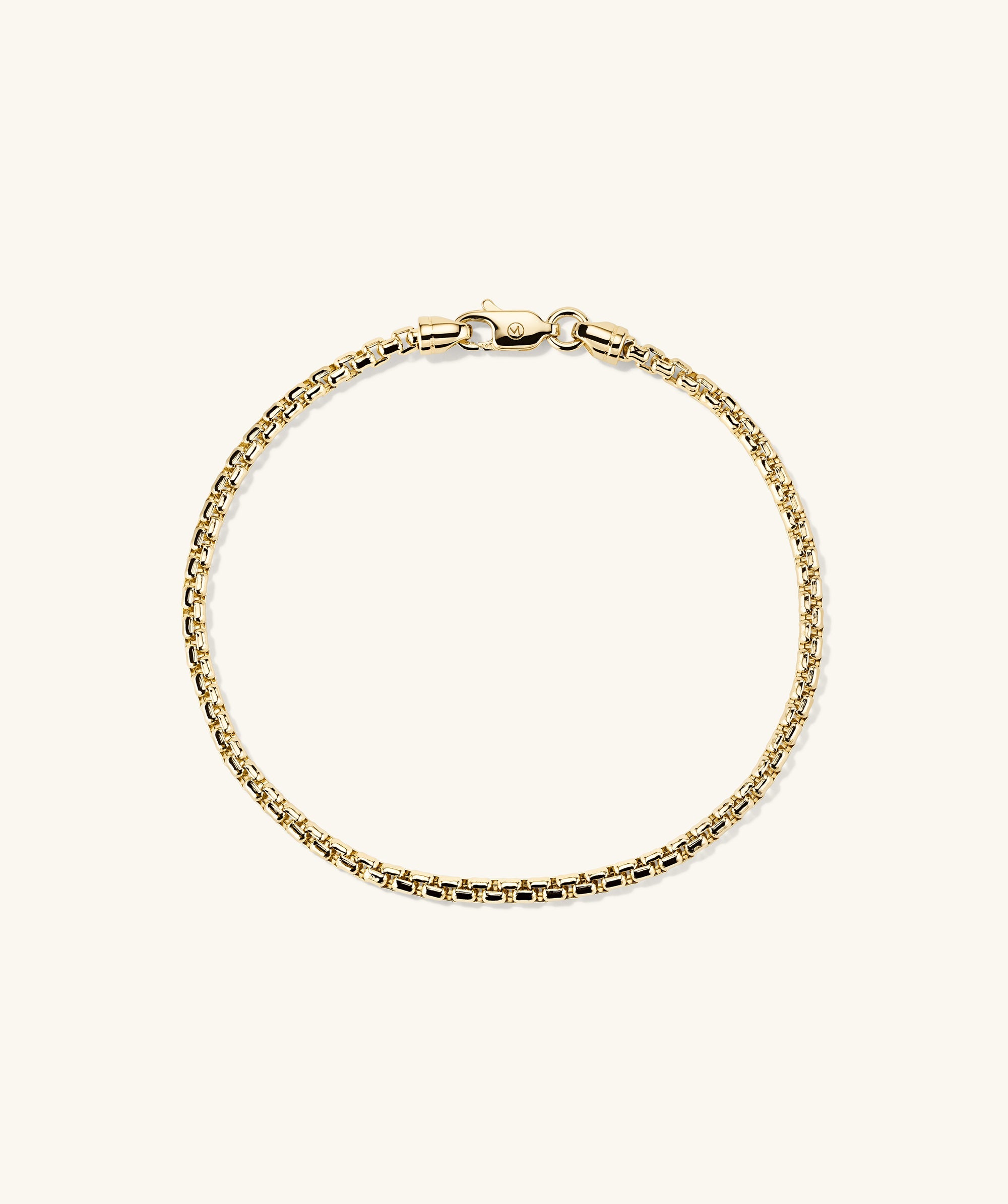 Gold chain bracelet with a clasp, designed for everyday wear, complements the Round Box Chain Necklace.