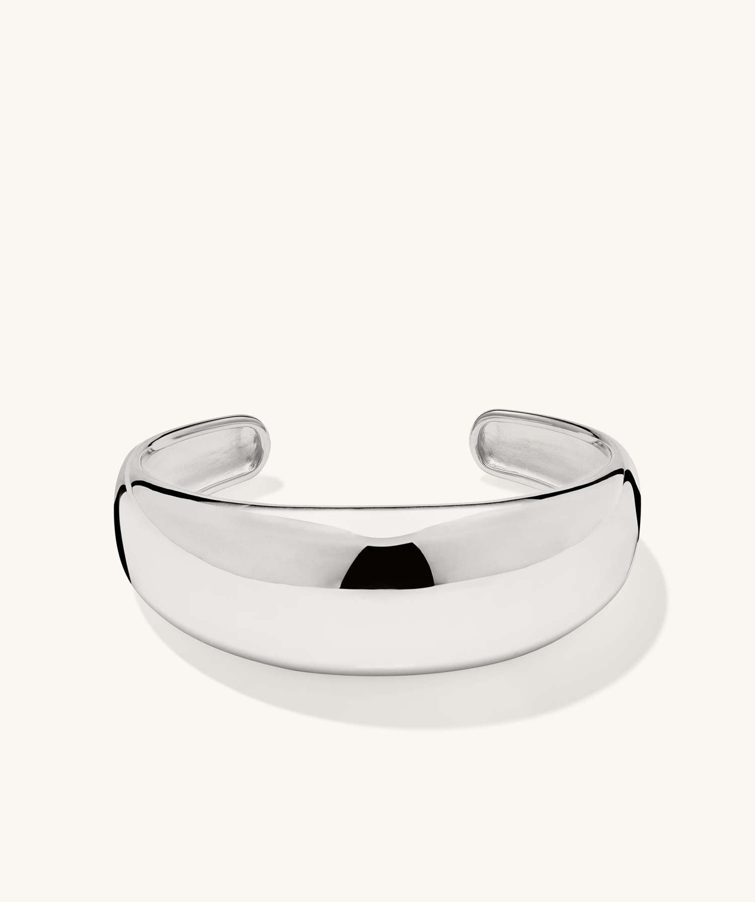 Silver 20mm DÃ´me Cuff Bracelet, intricately handcrafted in 925 sterling silver, displayed on a plain background, showcasing its elegant, puffed design.